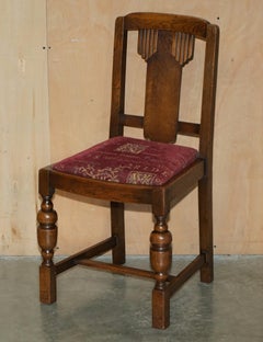PAIR OF ENGLISH OAK ART DECO HALL CHAIRS WiTH LATIN INSCRIBED SEAT UPHOLSTERY