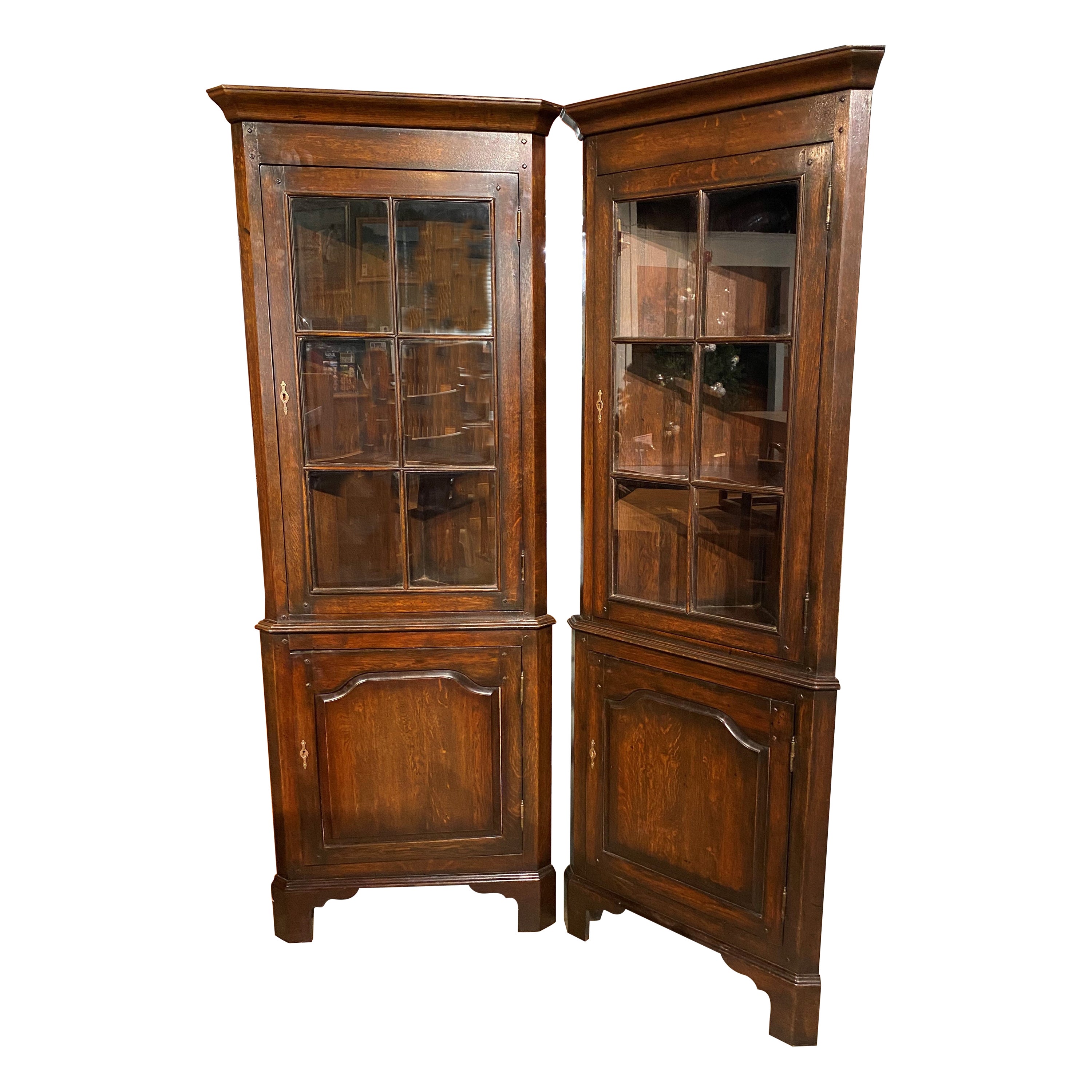 Pair of English Oak Diminutive Two Door Corner Cupboards