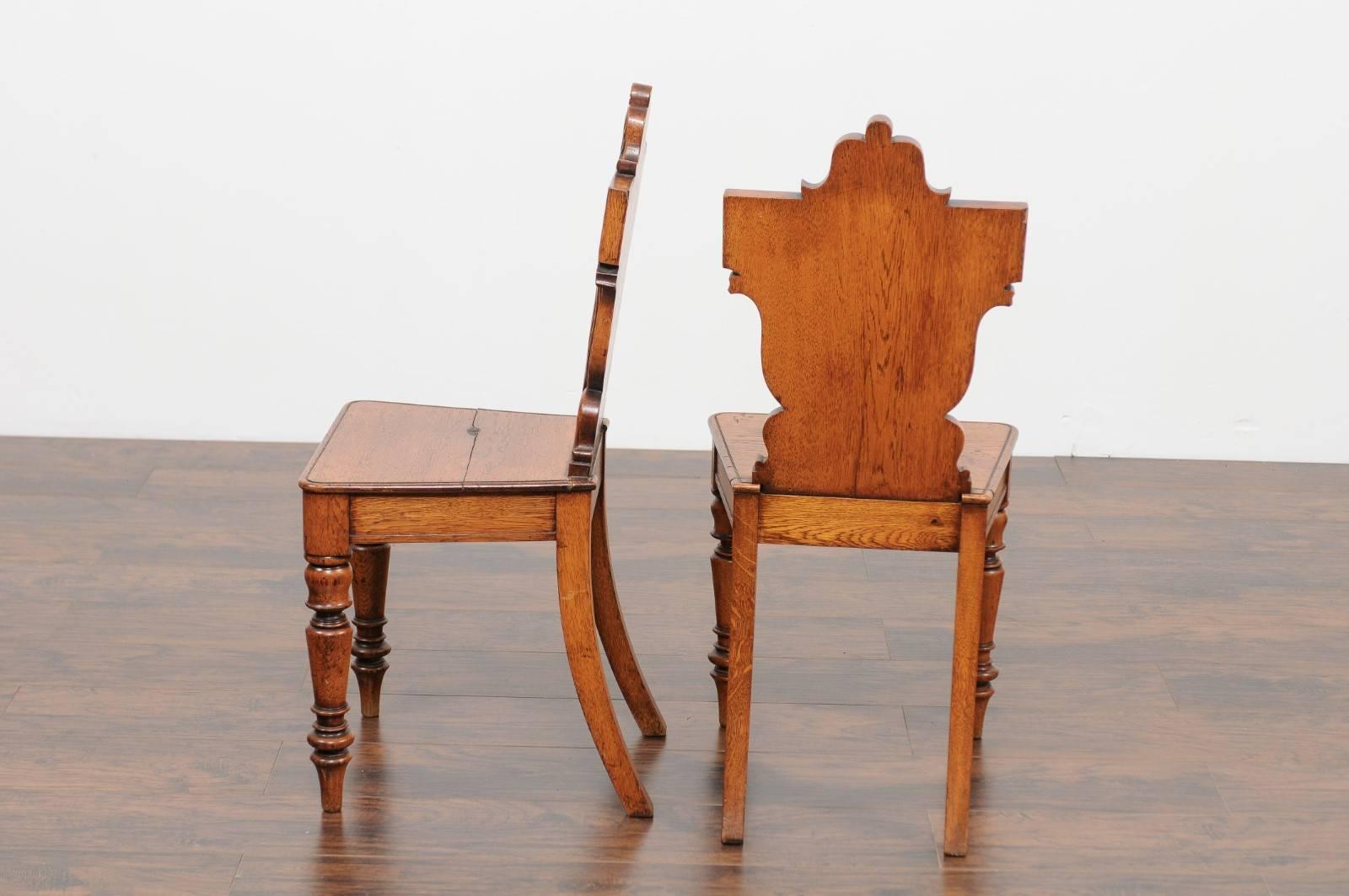 Pair of English Oak Hall Chairs with Carved Shield Backs and Cartouches, 1890s 2
