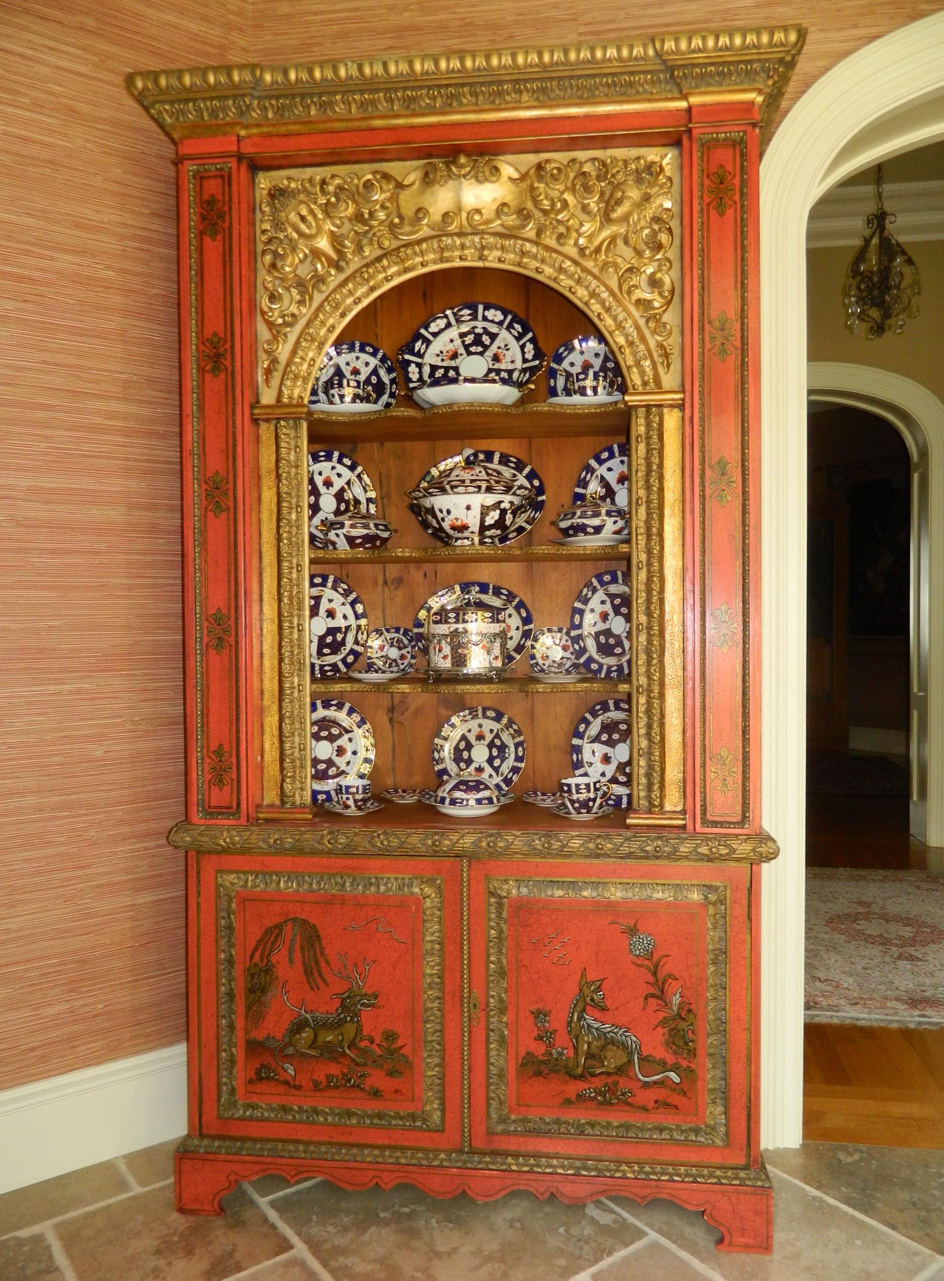 Pair of English painted and gold cabinets in the chinoiserie style, Early 20th century. Dishes are not included.