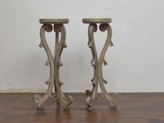 Pair of English Painted Carved Pedestals with Scrolling Legs, circa 1900