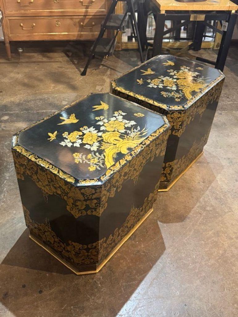 Great pair of vintage English painted and gilt tole trunk side tables. English painted and gilt tole trunk side tables offer a unique blend of artistry and function—perfect for adding character to a living room or study. Circa 1940. 24w x 18d x 23h