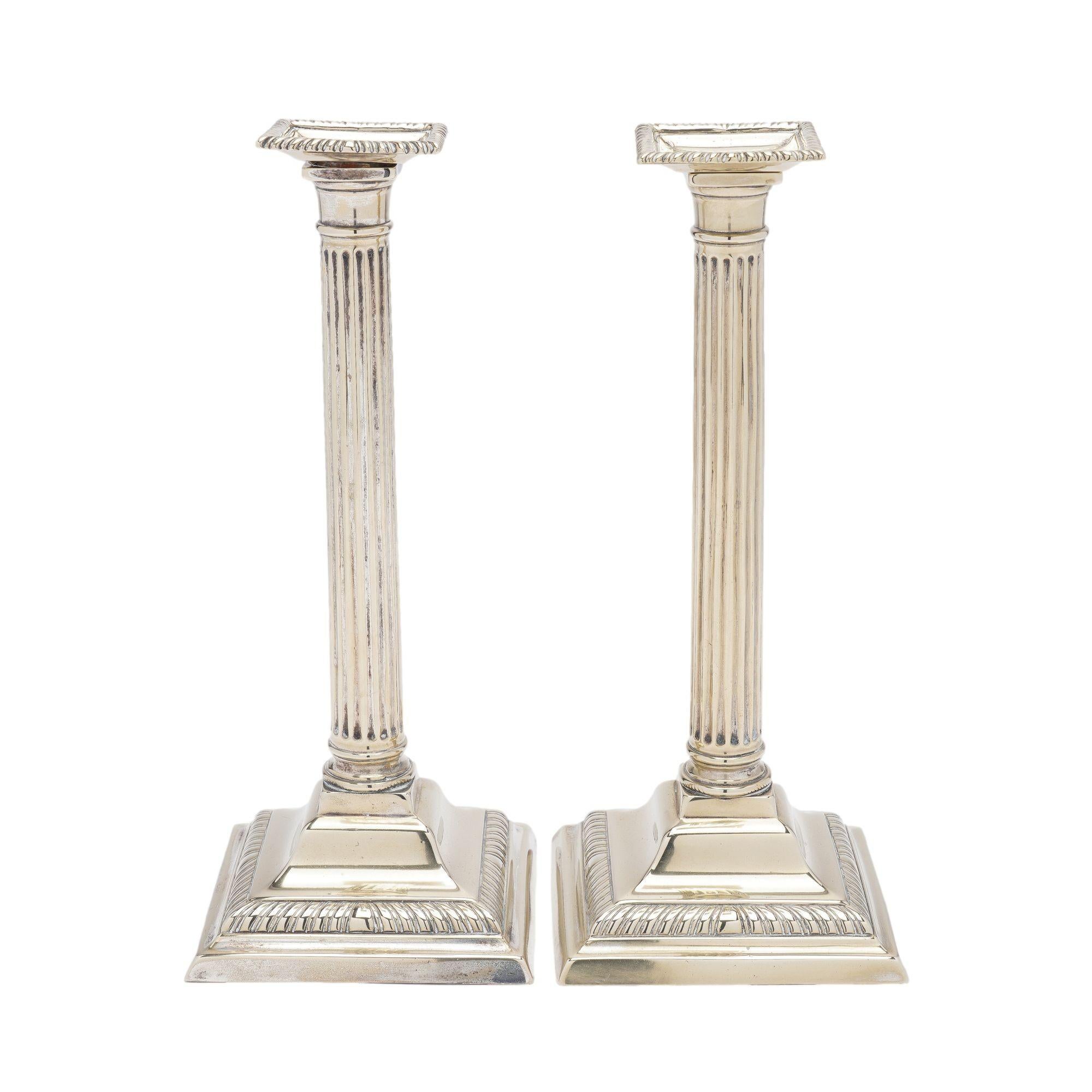 British Pair of English Paktong cast columnar candlesticks, c. 1780 For Sale