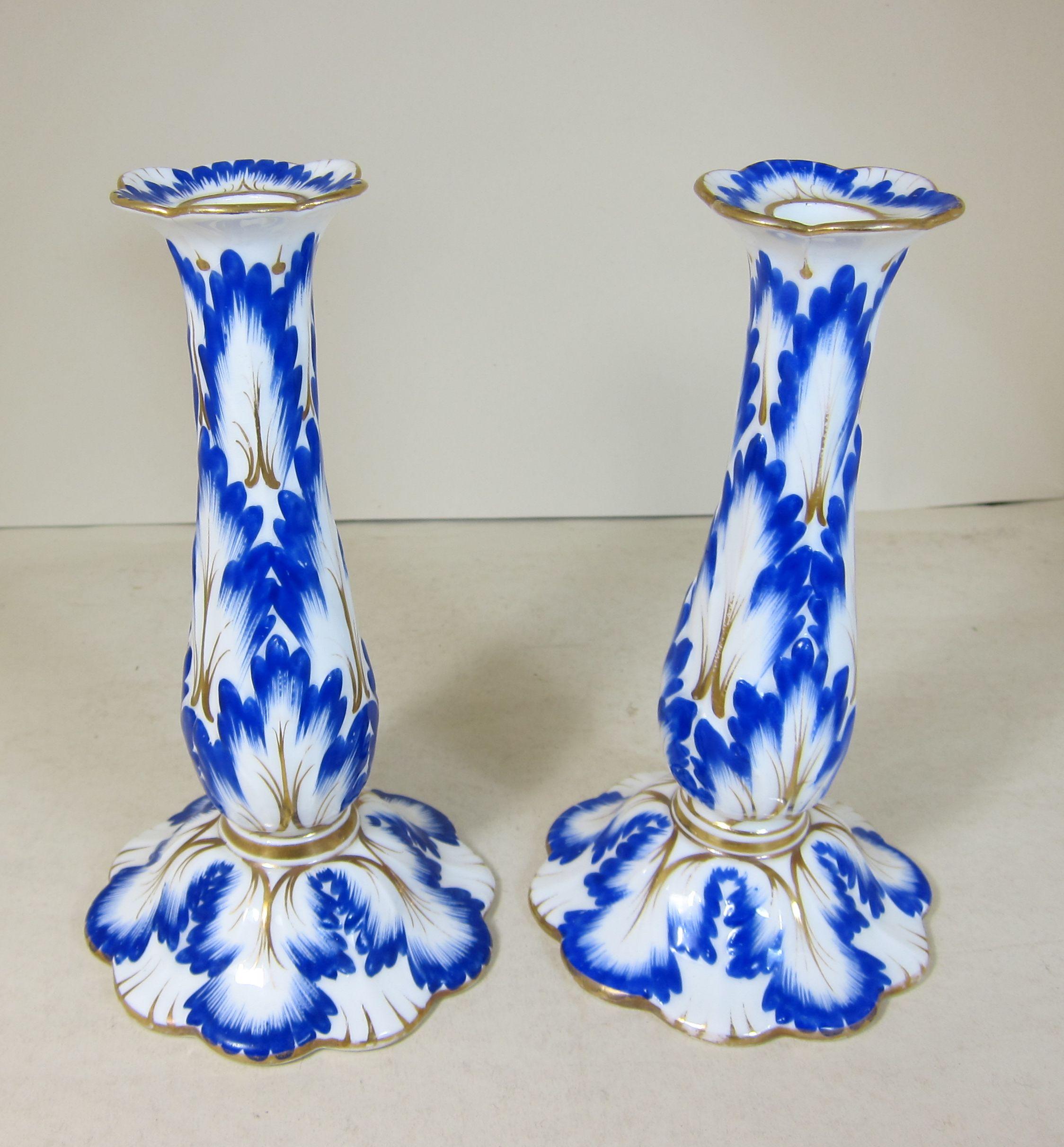 Pair of English Porcelain Candlesticks Decorated with Blue and Gilt Leaves 1