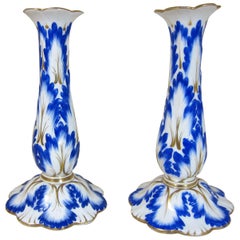 Pair of English Porcelain Candlesticks Decorated with Blue and Gilt Leaves