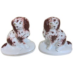 Antique Pair of English Porcelain Figures of Spaniels Decorated in Brown
