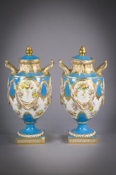 Pair of English Porcelain Two Handled Covered Vases, circa 1850