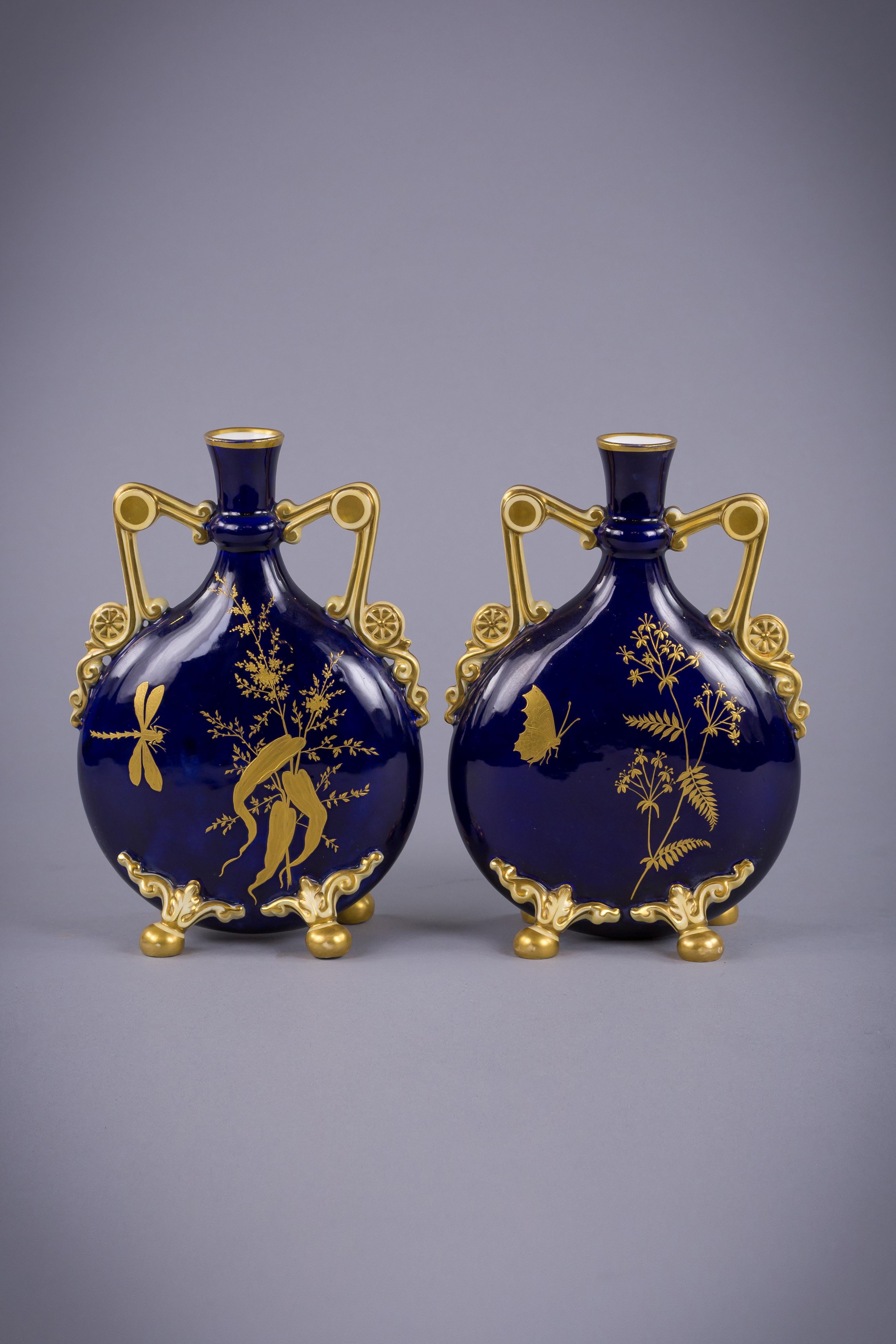 In Orientalist style with gilt floral and butterfly decoration on cobalt ground.