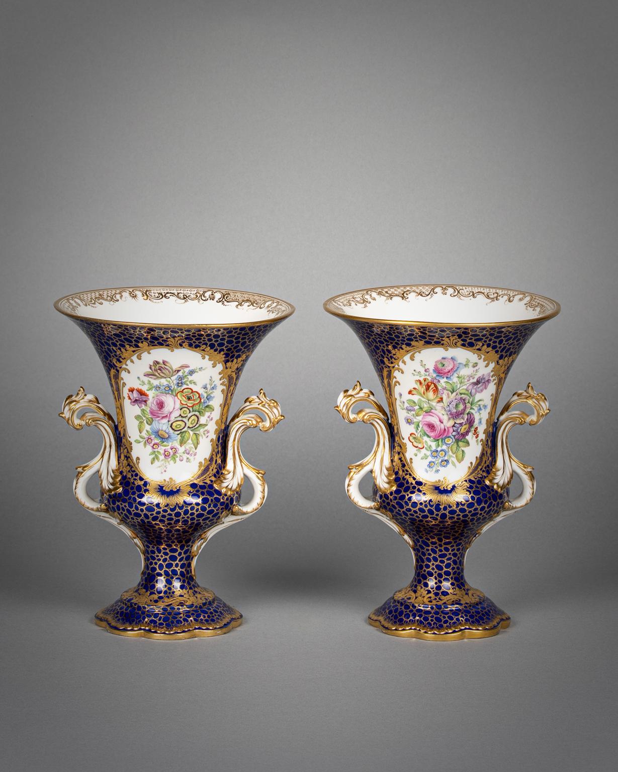 In the Sevres style. One side with a scenic cartouche, the other with floral.