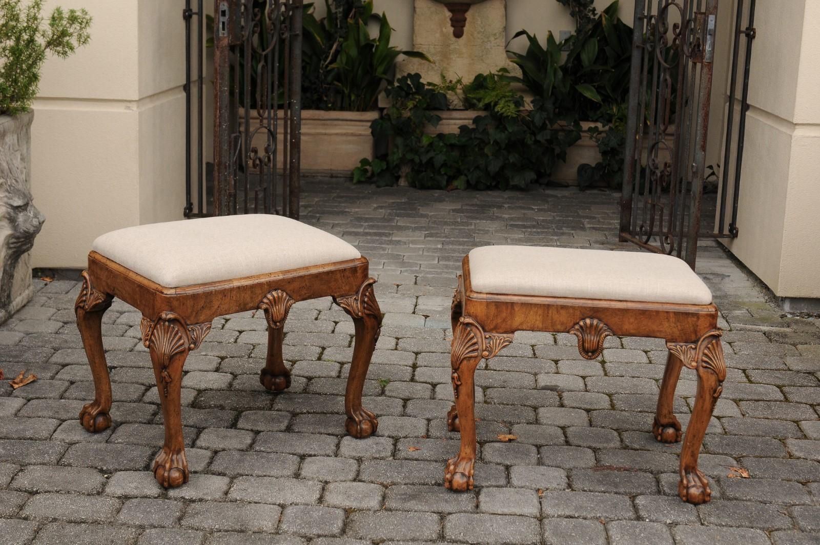 20th Century Pair of English Queen Anne Style Walnut Stools with Carved Shells and Upholstery For Sale