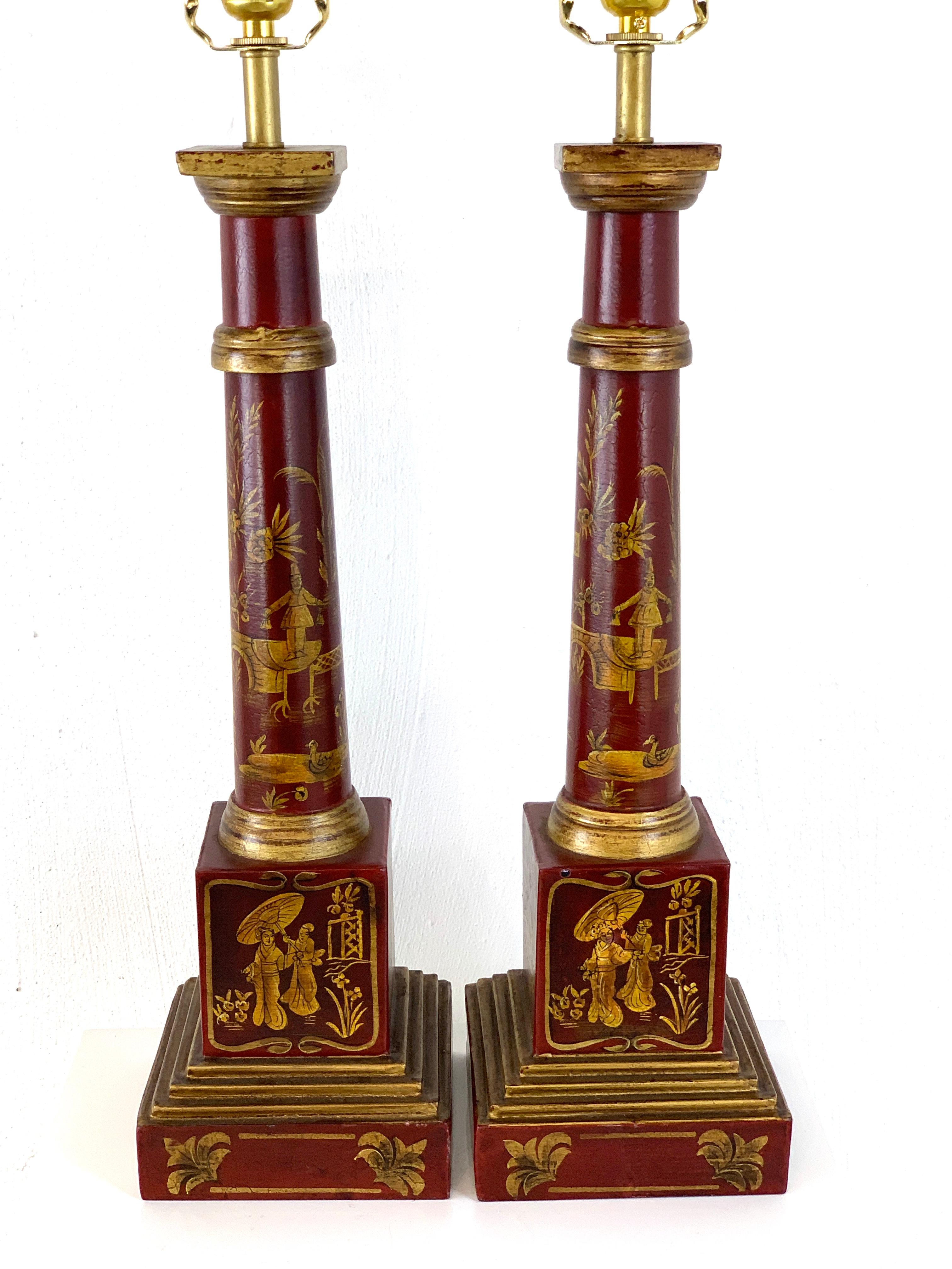Pair of English red tole gilt chinoiserie column lamps, beautifully decorated on all sides. New wiring
Measures: 6