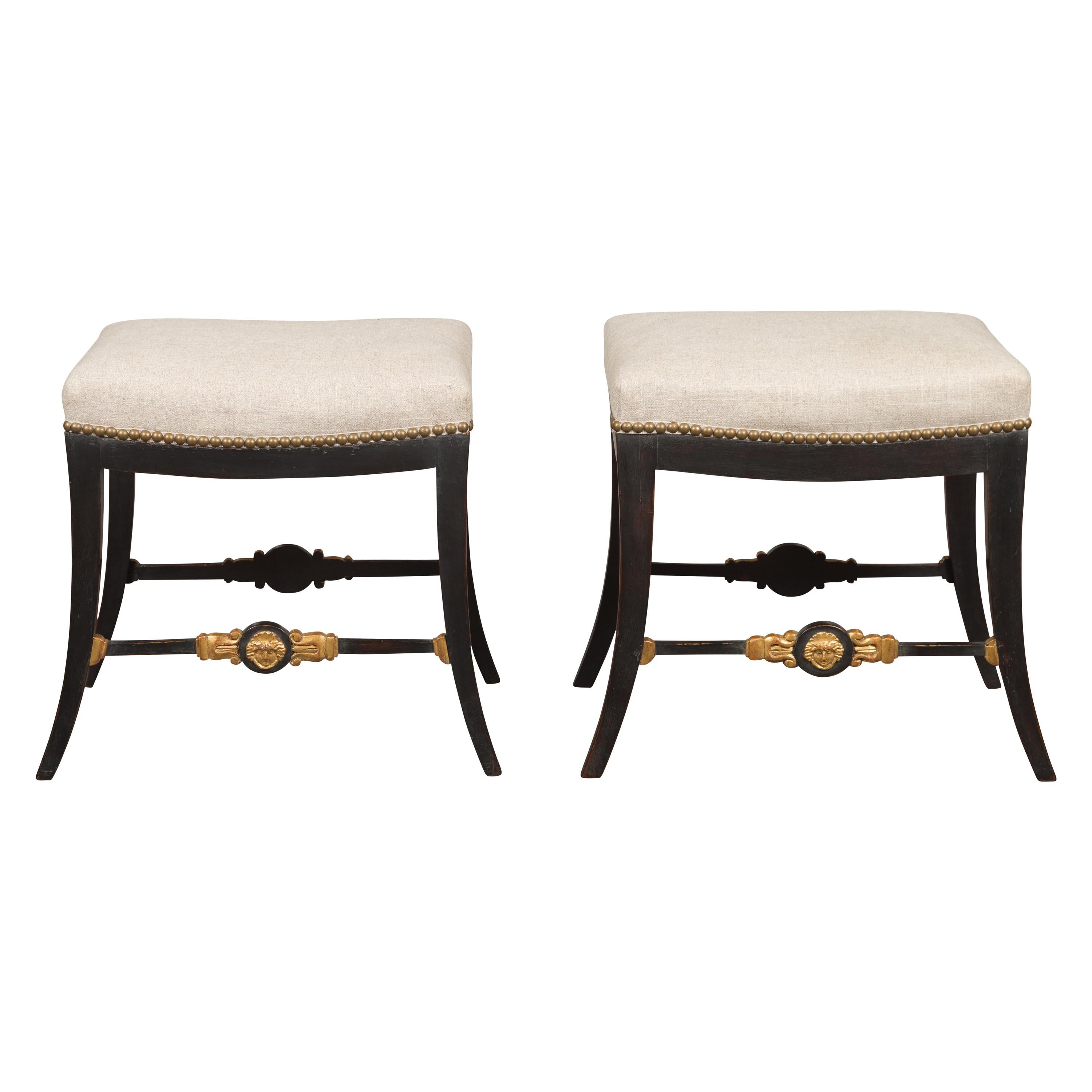 Pair of English Regency 1820s Ebonized and Gilt Stools with New Upholstery For Sale