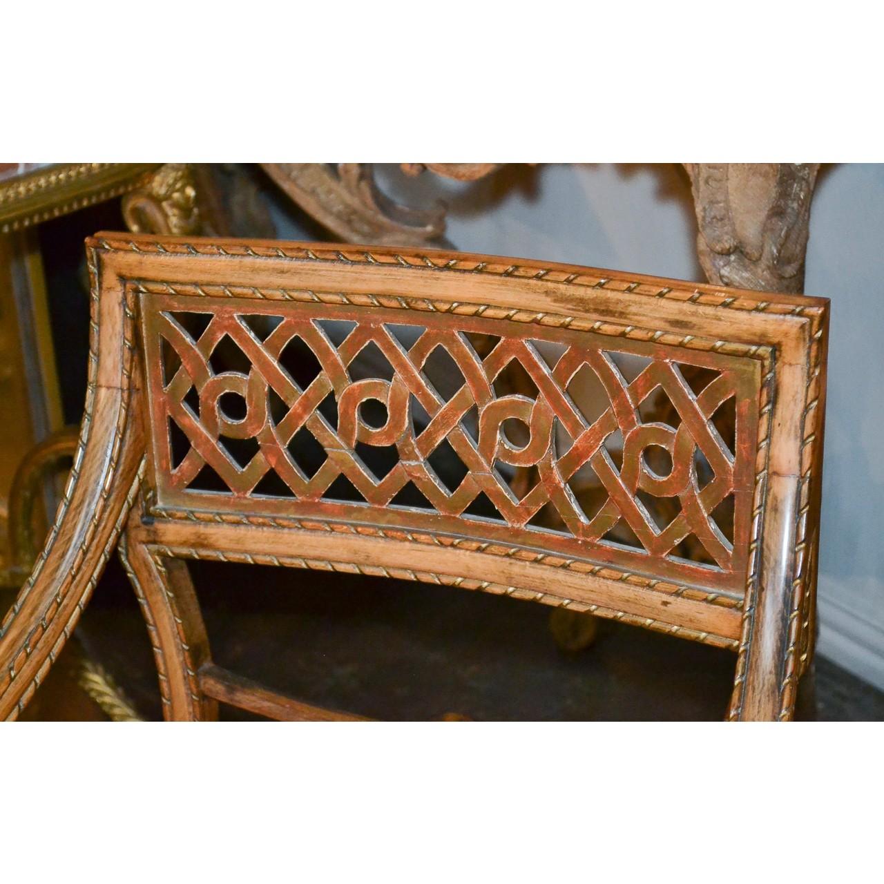 Handsome pair of mid-century English Regency armchairs crafted of solid maple and birch with hand-carved rope trim, superb interlaced carved backs and upholstered seats. Each on slightly splayed and tapered legs,

circa 1960.