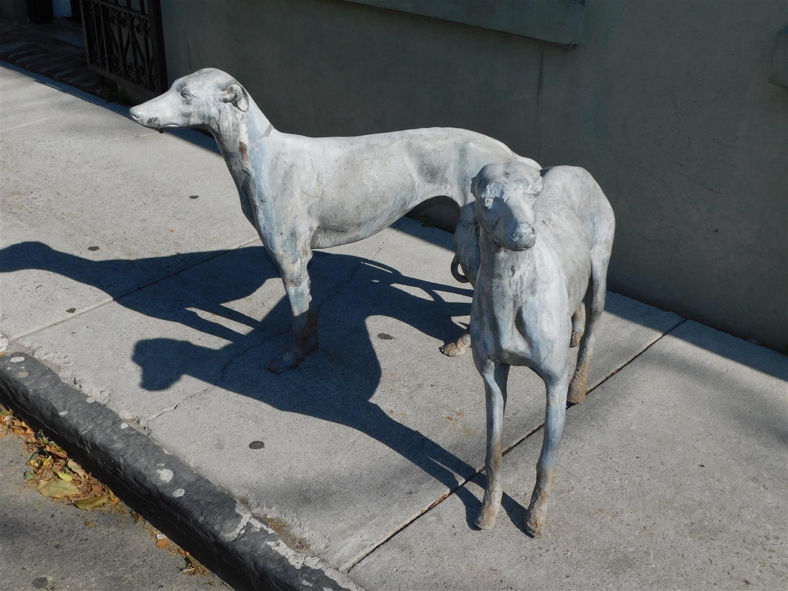 Pair of English Regency life size cast lead Whippet / Greyhound dogs garden figures, Early 19th Century