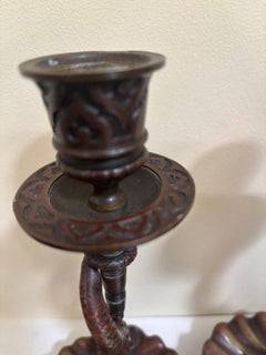 Pair of English Regency dolphin candlesticks