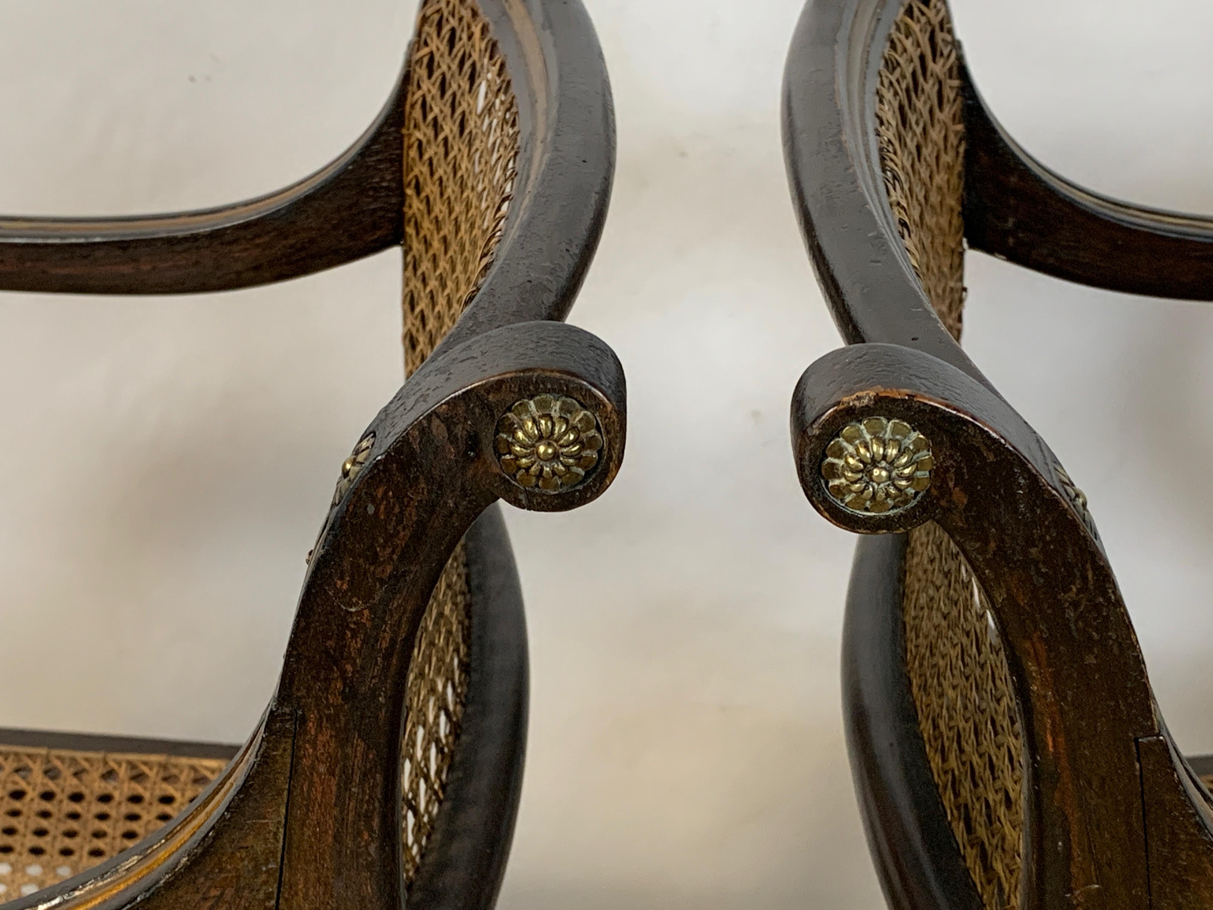 Pair of English Regency Ebonized and Gilded Armchairs 2