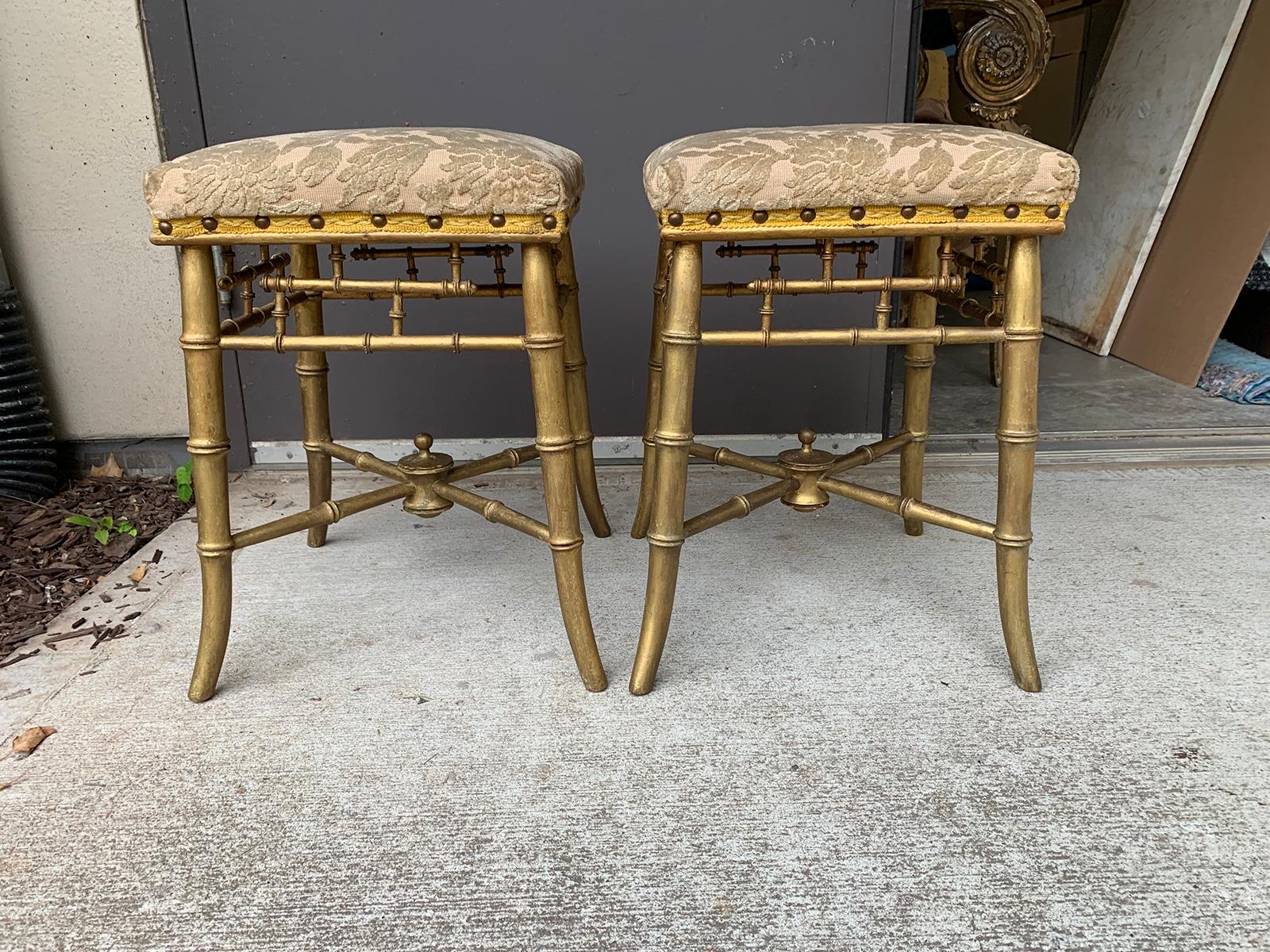 Pair of English Regency giltwood faux bamboo stools, circa 1825.