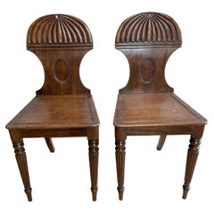 Pair of English Regency mahogany Gillows hall chairs 