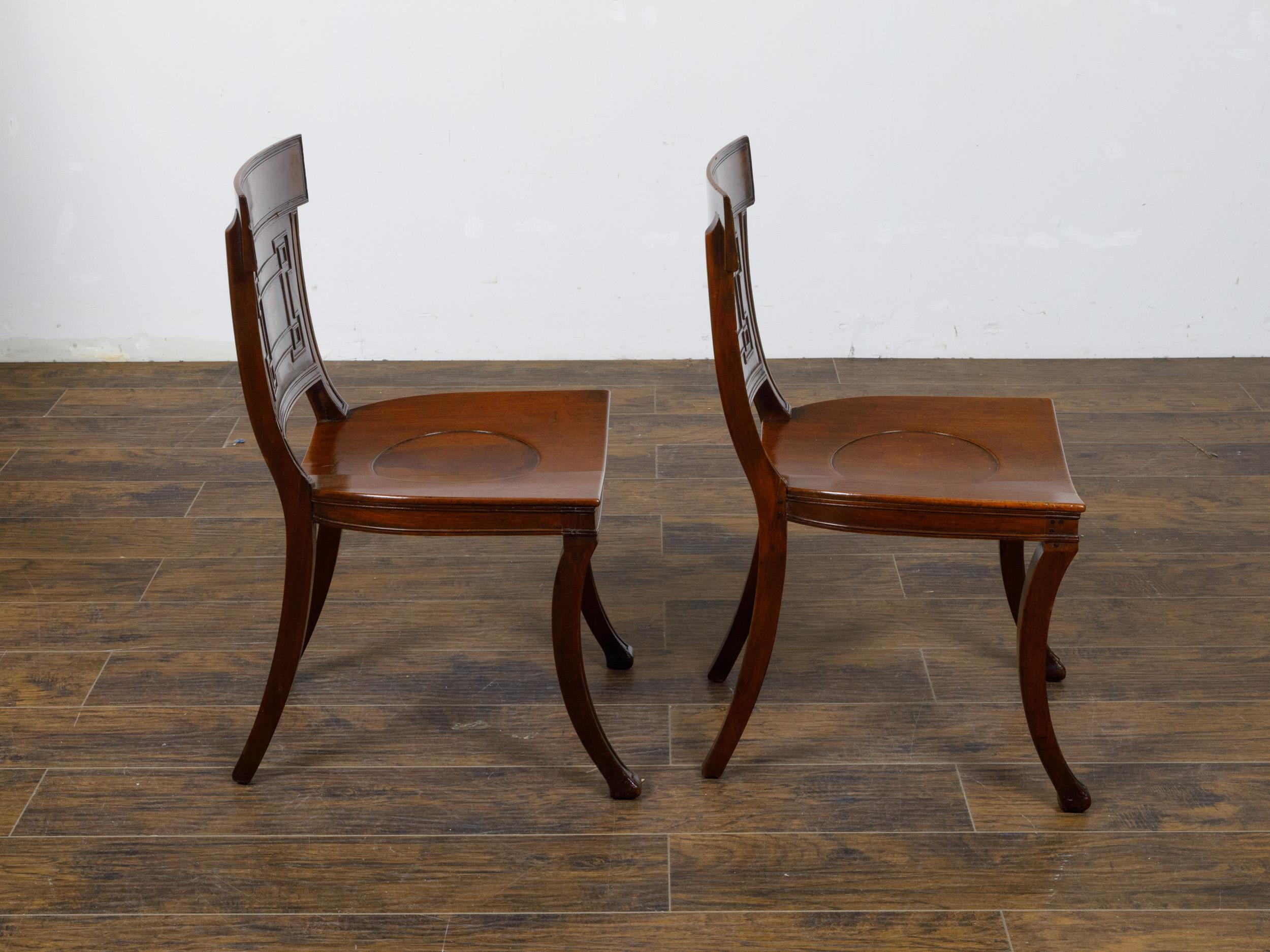 19th Century Pair of English Regency Mahogany Hall Chairs with Painted Coat of Arms For Sale