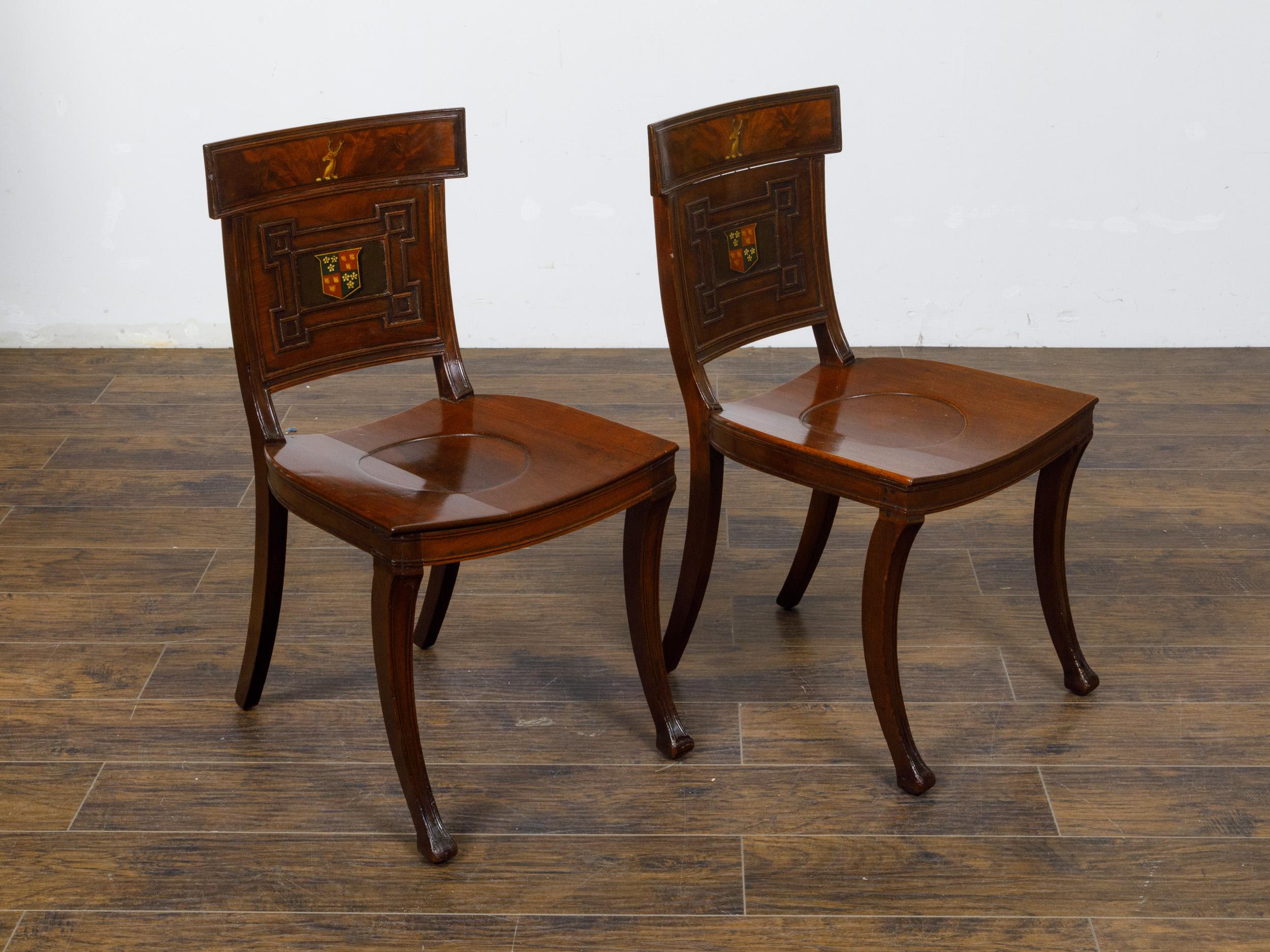 Pair of English Regency Mahogany Hall Chairs with Painted Coat of Arms For Sale 1