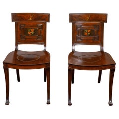 Antique Pair of English Regency Mahogany Hall Chairs with Painted Coat of Arms