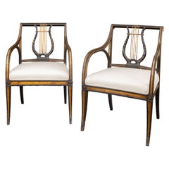 Pair of English Regency Period 1820s Ebonized and Gilt Armchairs with Upholstery