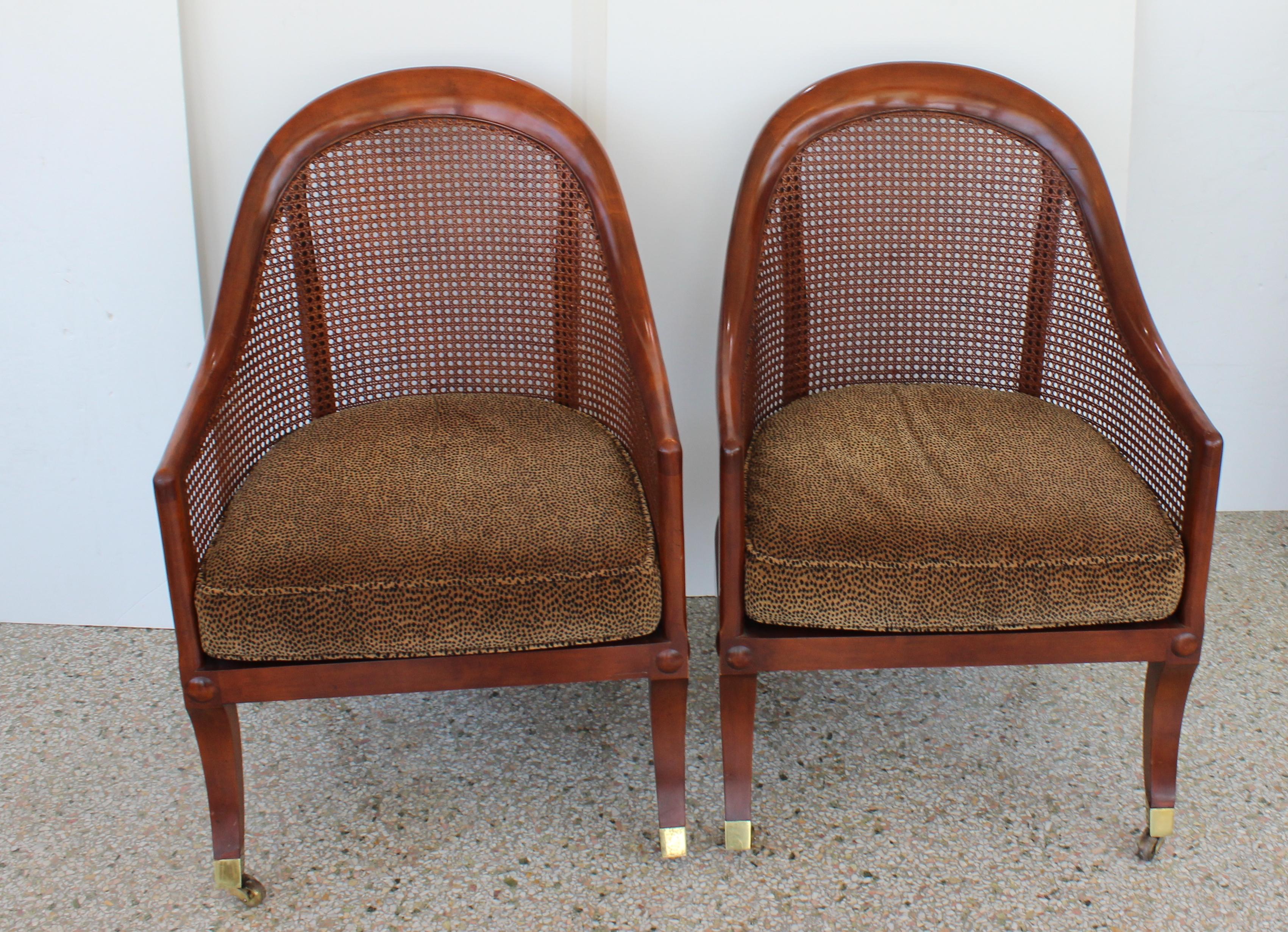 This stylish pair of English Regency style chairs date to the 1980s and were sold by Baker Furniture.

Note: The seat cushions have hidden zipppers. 

Note: We have a total of four of these chairs, and the other set is also listed on Dibs.