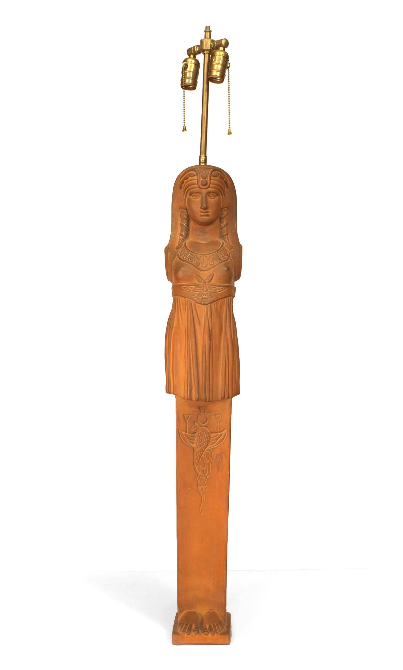 Pair of English Regency style (19th-20th century) terra-cotta Egyptian pilaster form classical figures of women mounted as table lamps.
 