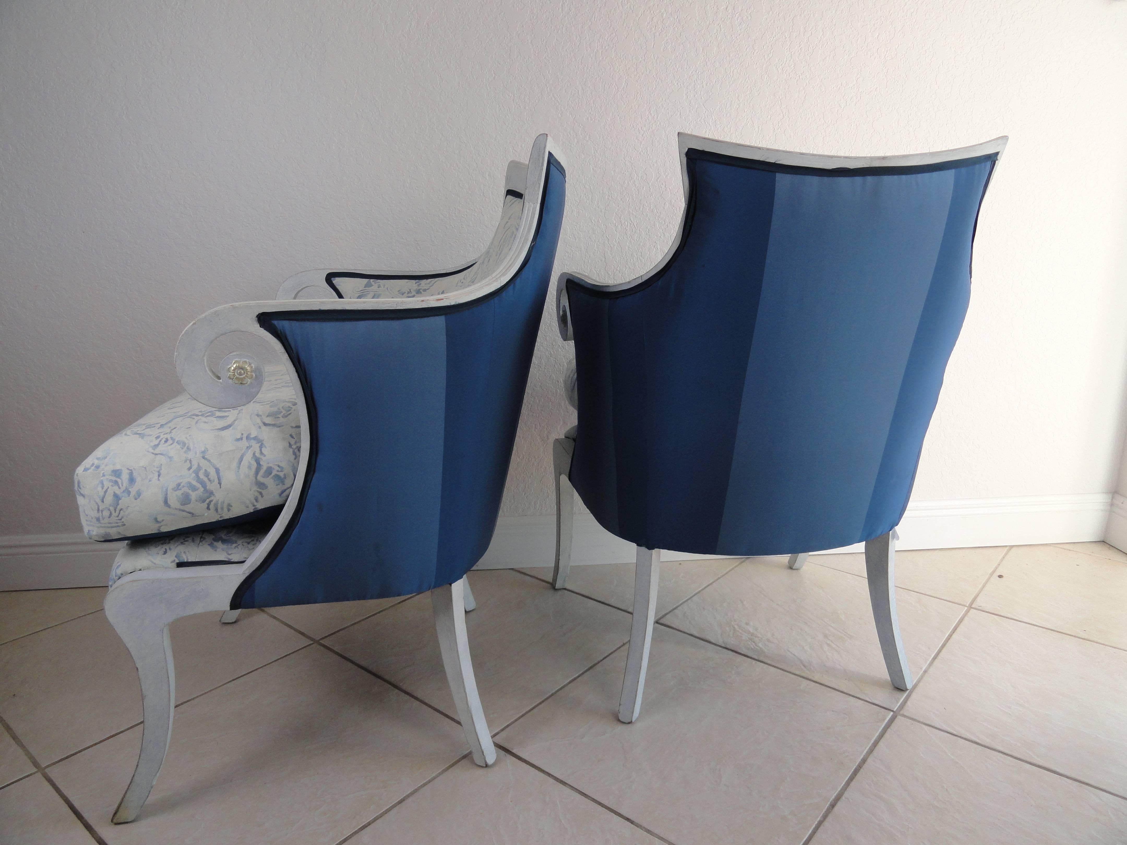 Pair of English Regency style wood chairs upholstered in Fortuny cotton fabric and silk.