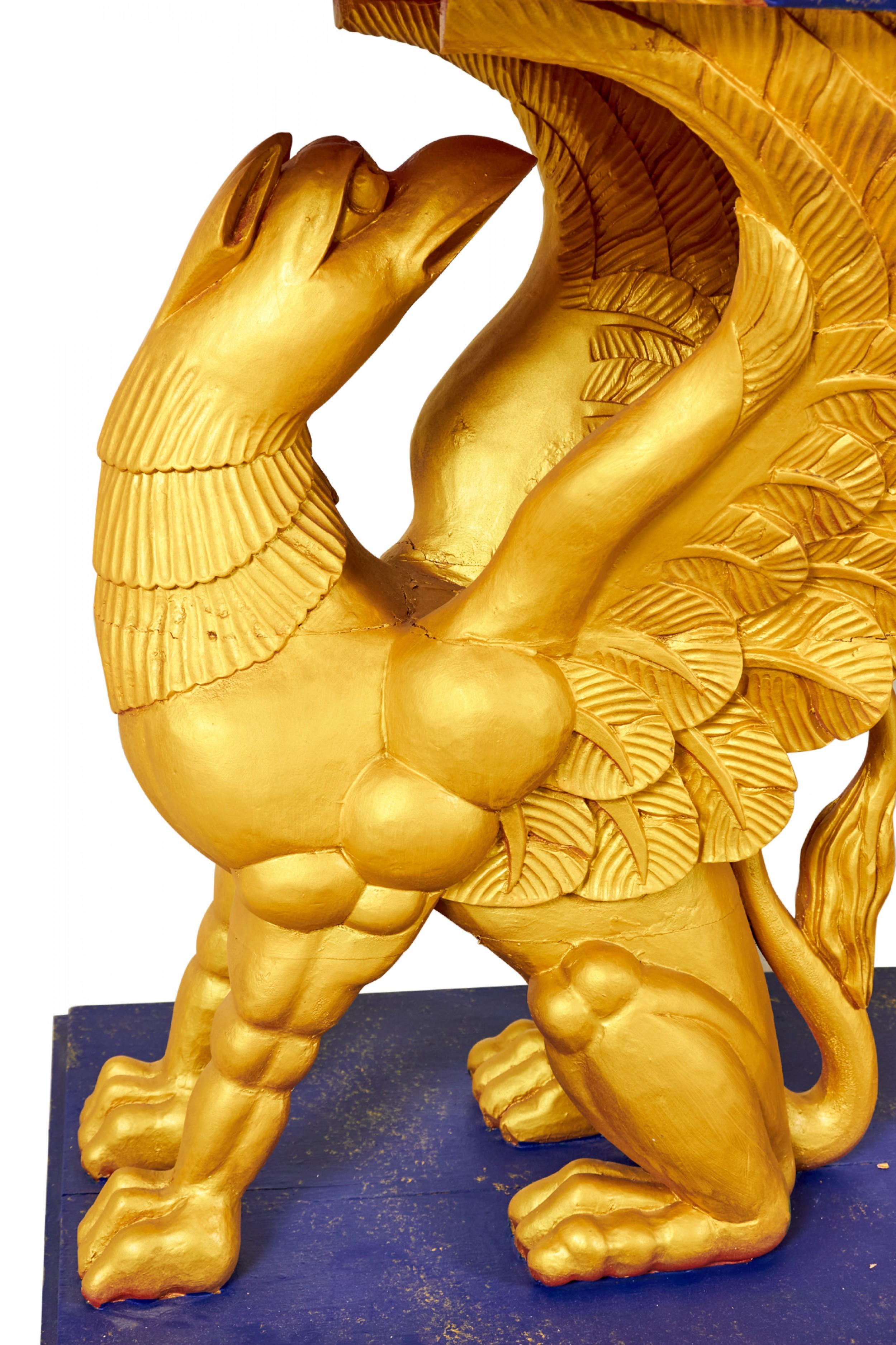 Hand-Carved Pair of English Regency Style Gilt Eagle Base and Faux Blue Stone Console Tables For Sale