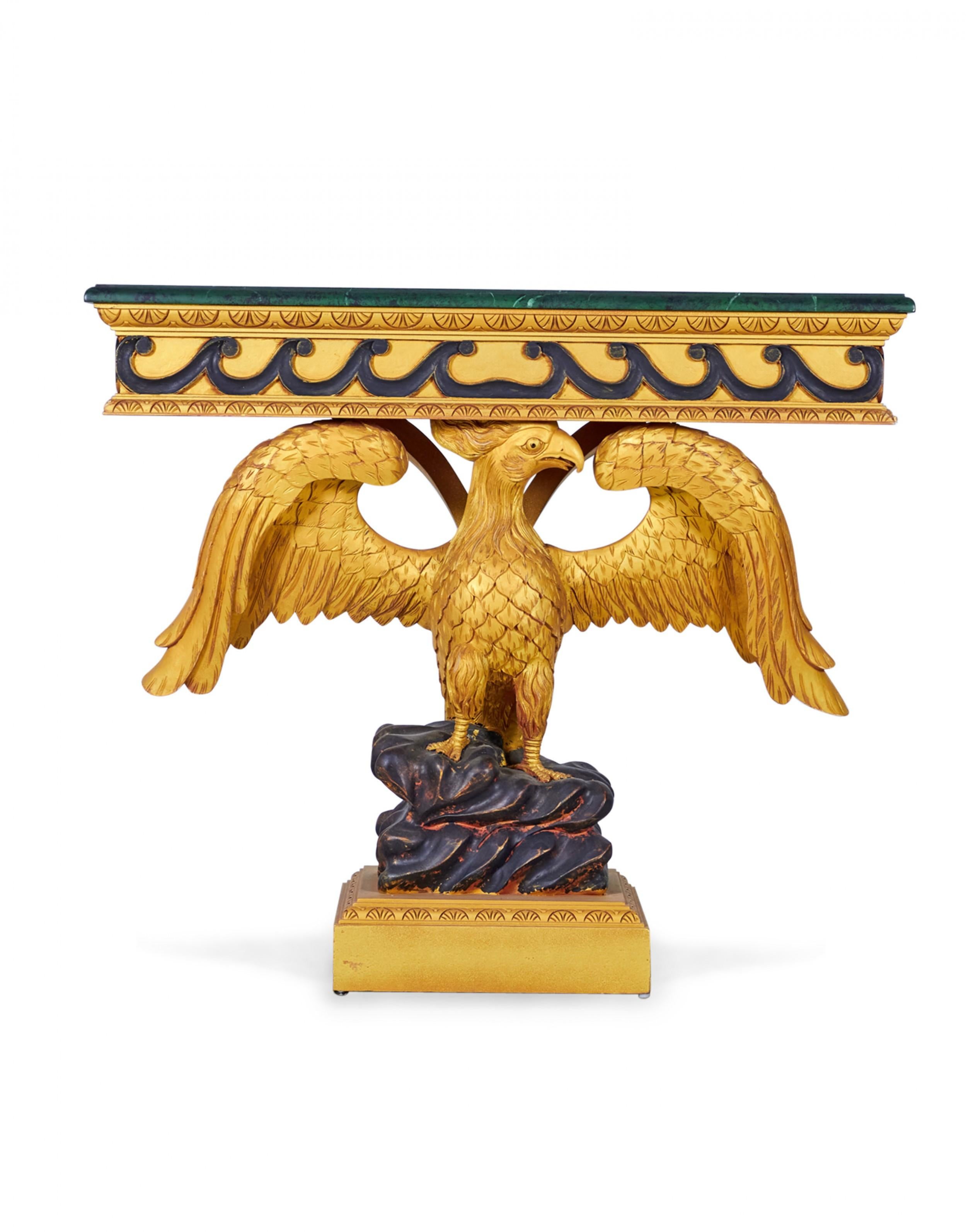 PAIR of English Regency-style console tables with painted faux green marble wooden tops resting on carved wooden gilt eagle bases. (PRICED AS PAIR)

Condition: Good; Wear consistent with age and use