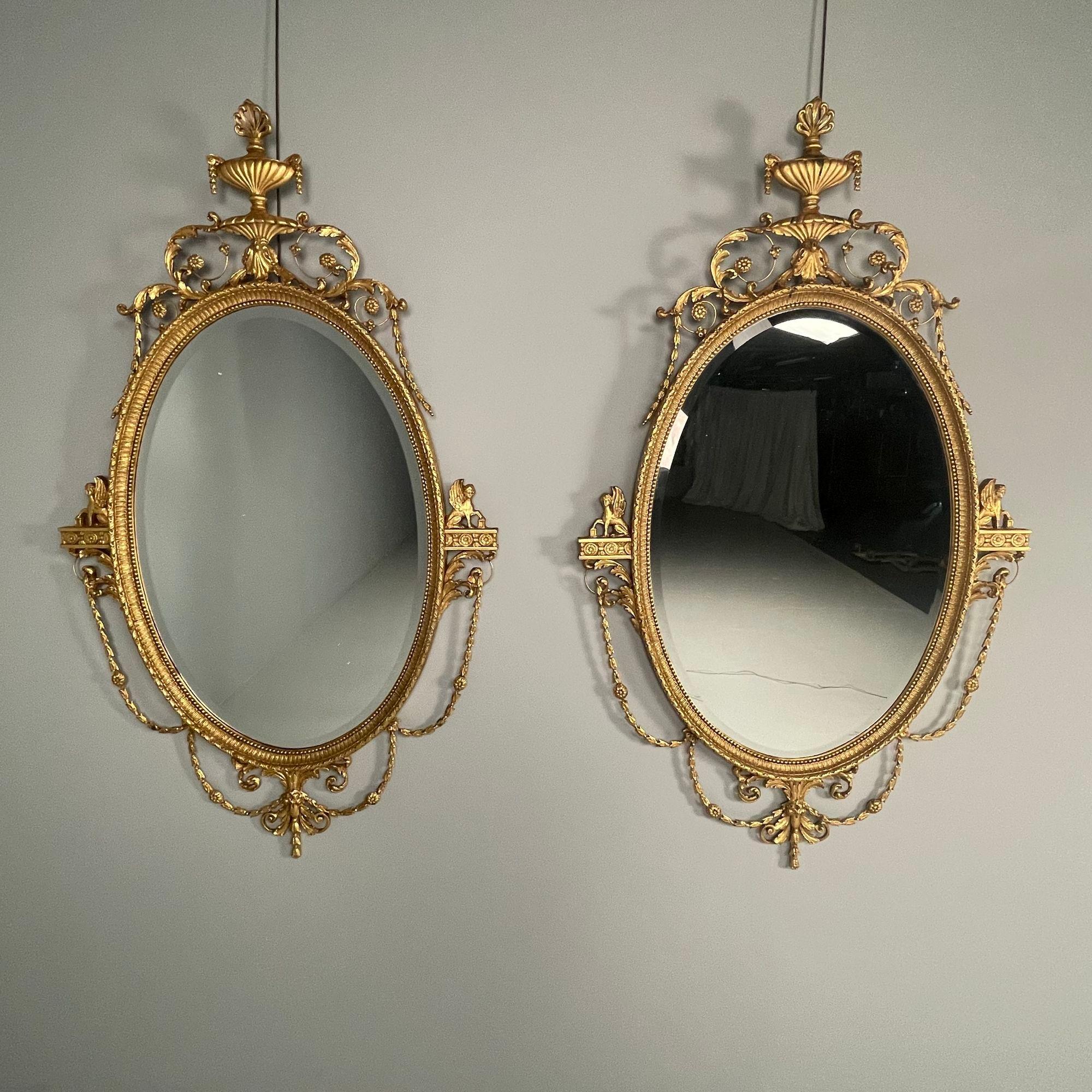 Pair of English Regency Style Gilt Wood Oval Mirror, Wall, Console, Over Mantle

Each oval center clean mirror is elaborately decorated with swags, urns and griffins. Very fine condition.

H 69 W 40.5 D 2.25 Excellent Condition

LHX
