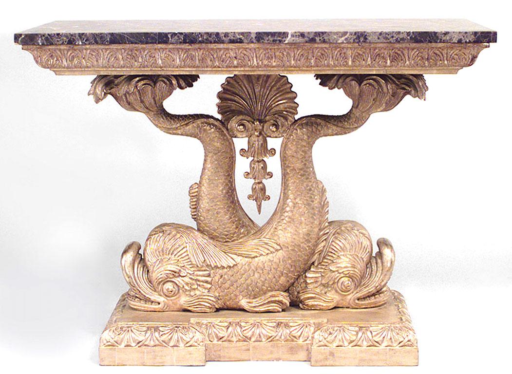 Pair of English Regency style giltwood console tables with brown marble top on entwined dolphins supporting centre shell (20th century).
   