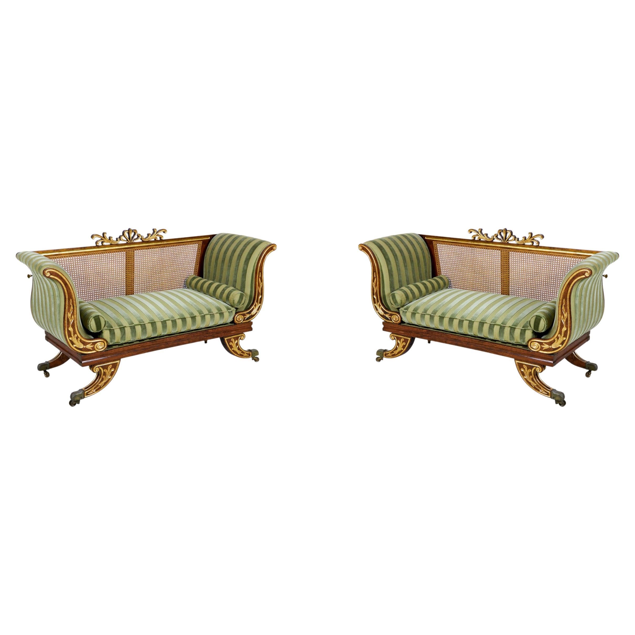 Pair of English Regency Style Parcel Gilt Caned Back Settees For Sale