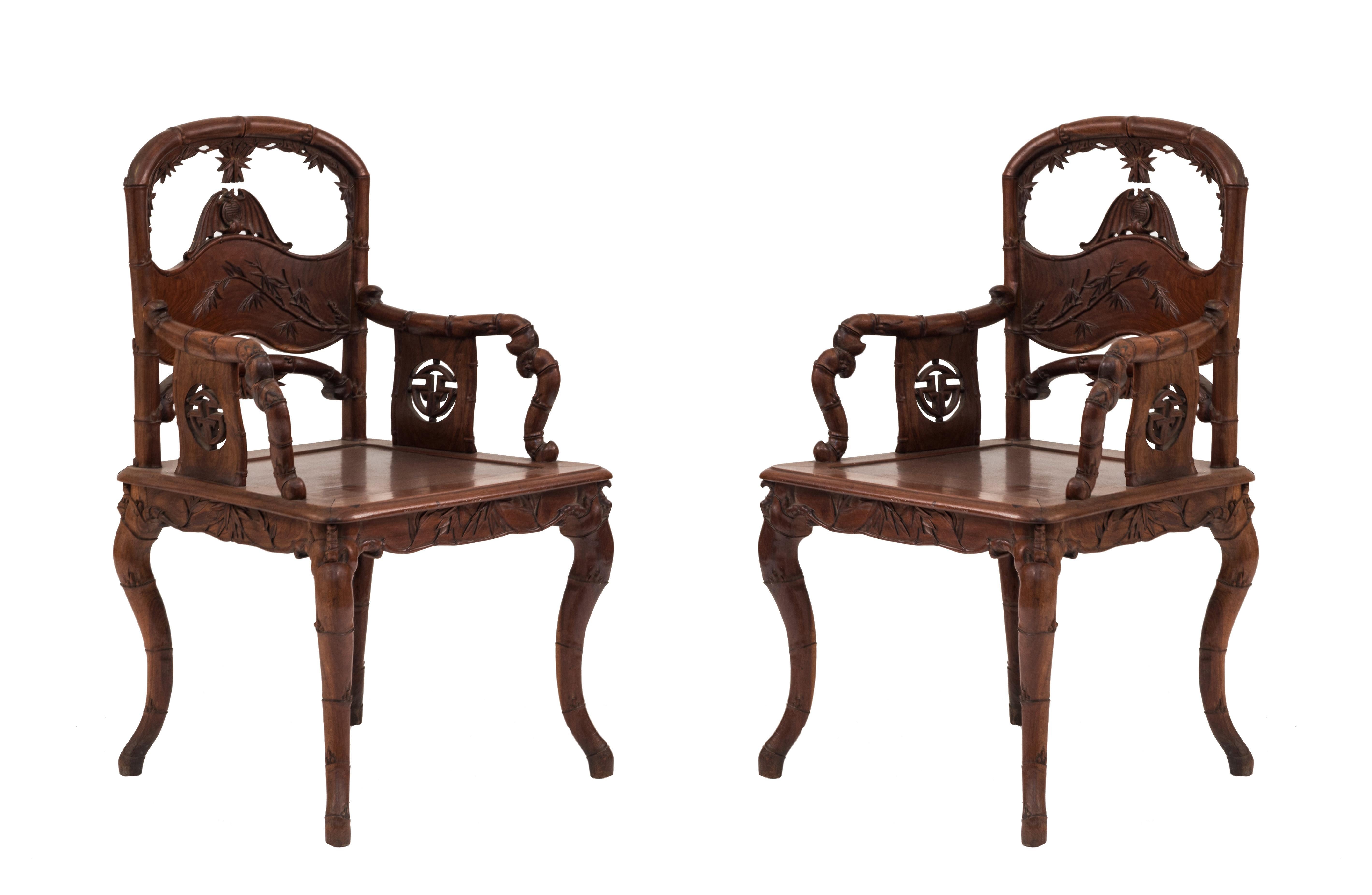 Pair of English Regency-style (19/20th Century) rosewood faux bamboo carved armchairs with open and filigree-carved backs (PRICED AS Pair) (Matching loveseat: 012350)
