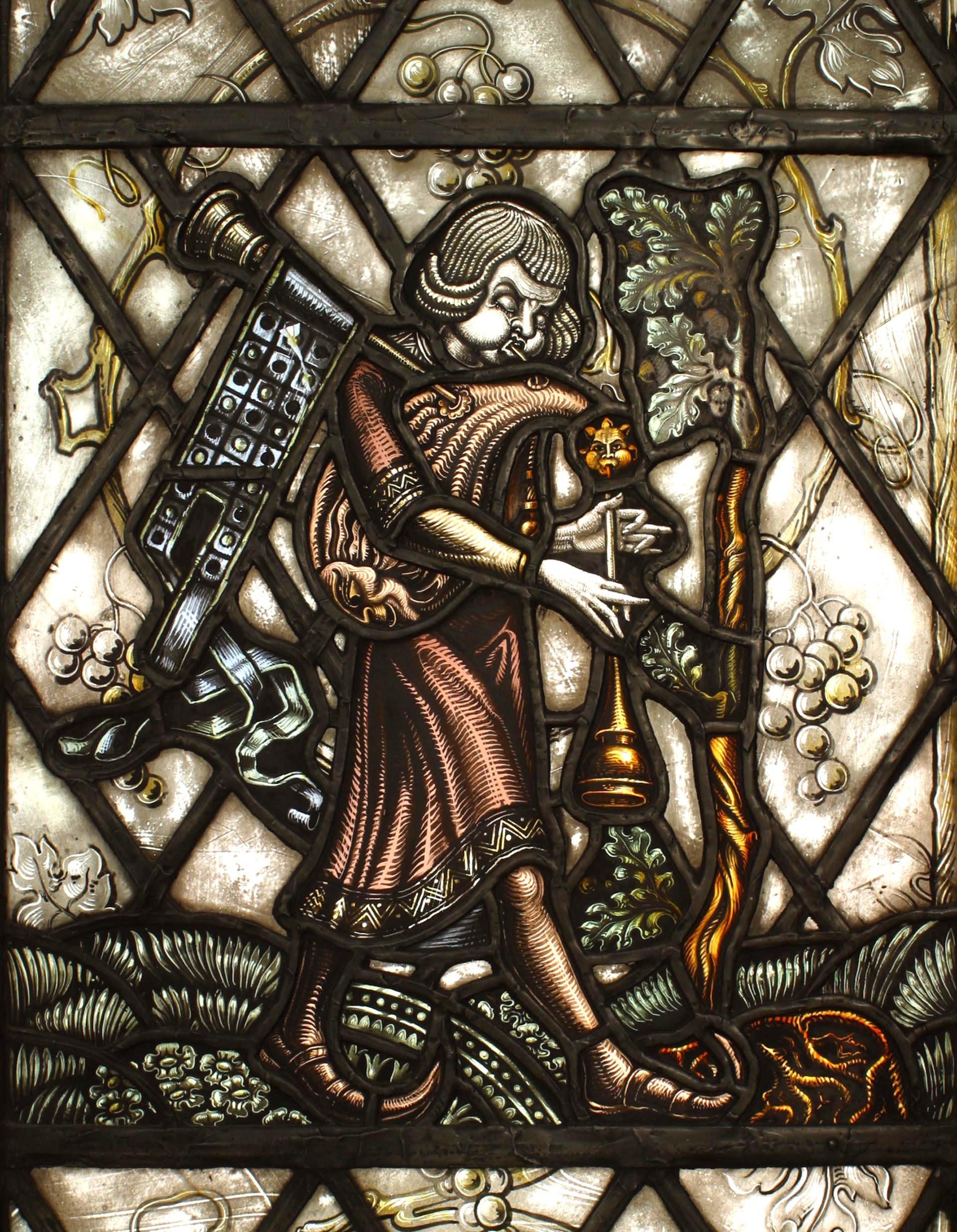 Pair of English Renaissance style painted glass windows with a bagpiper and huntsman surrounded by scrolling vines, late 19th century.
