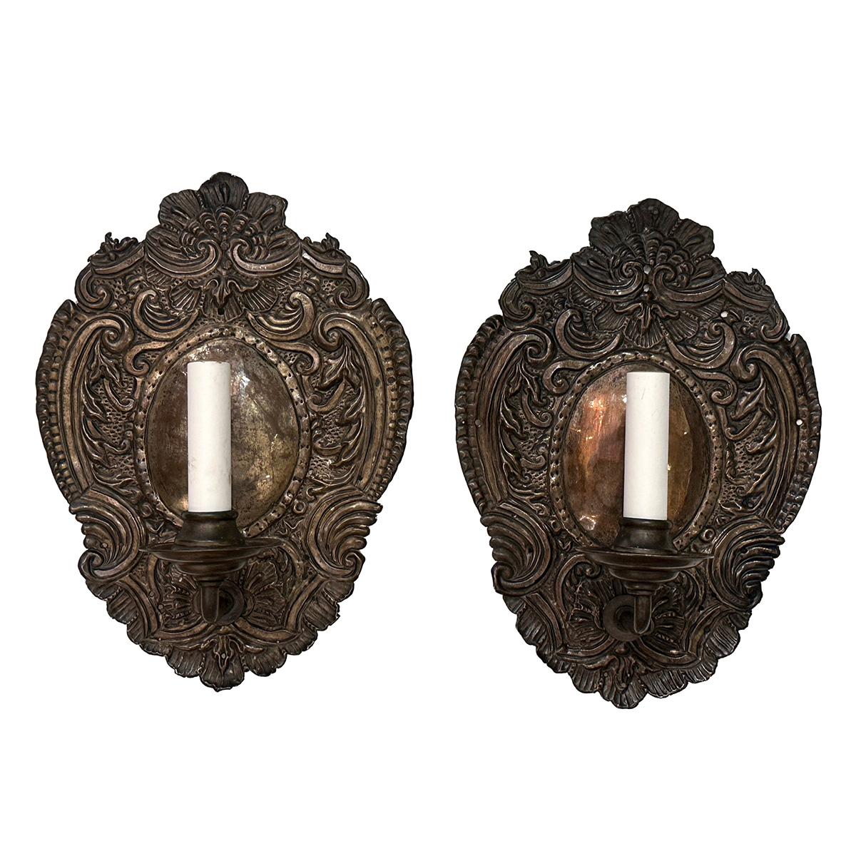 Pair of English repousse metal sconces with foliage motif.
Measurements:
Height: 12