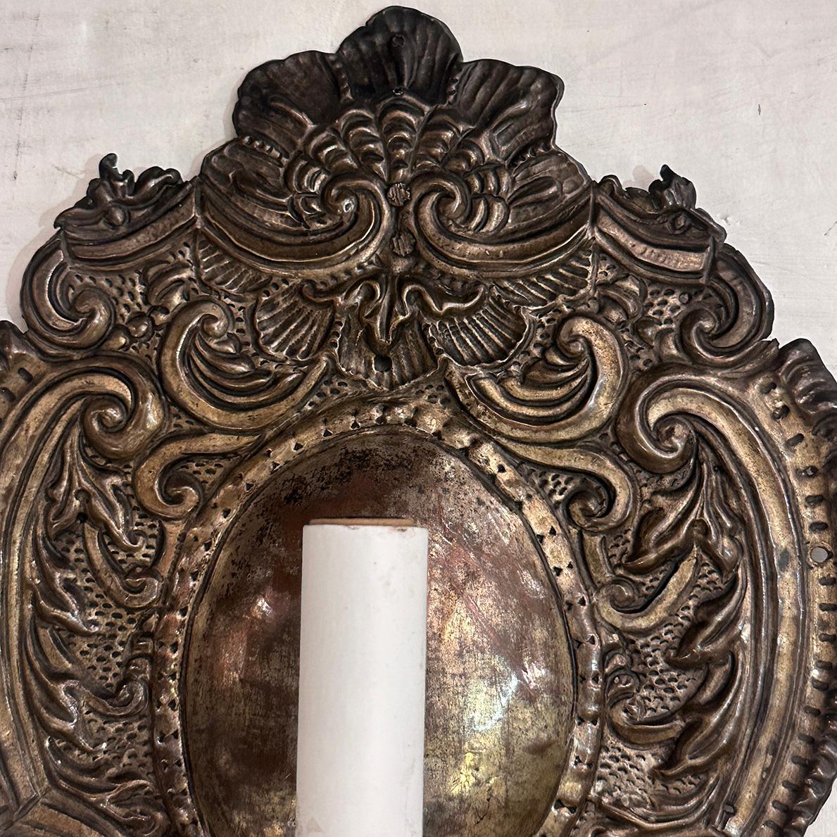 Early 20th Century Pair of English Repousse Sconces For Sale