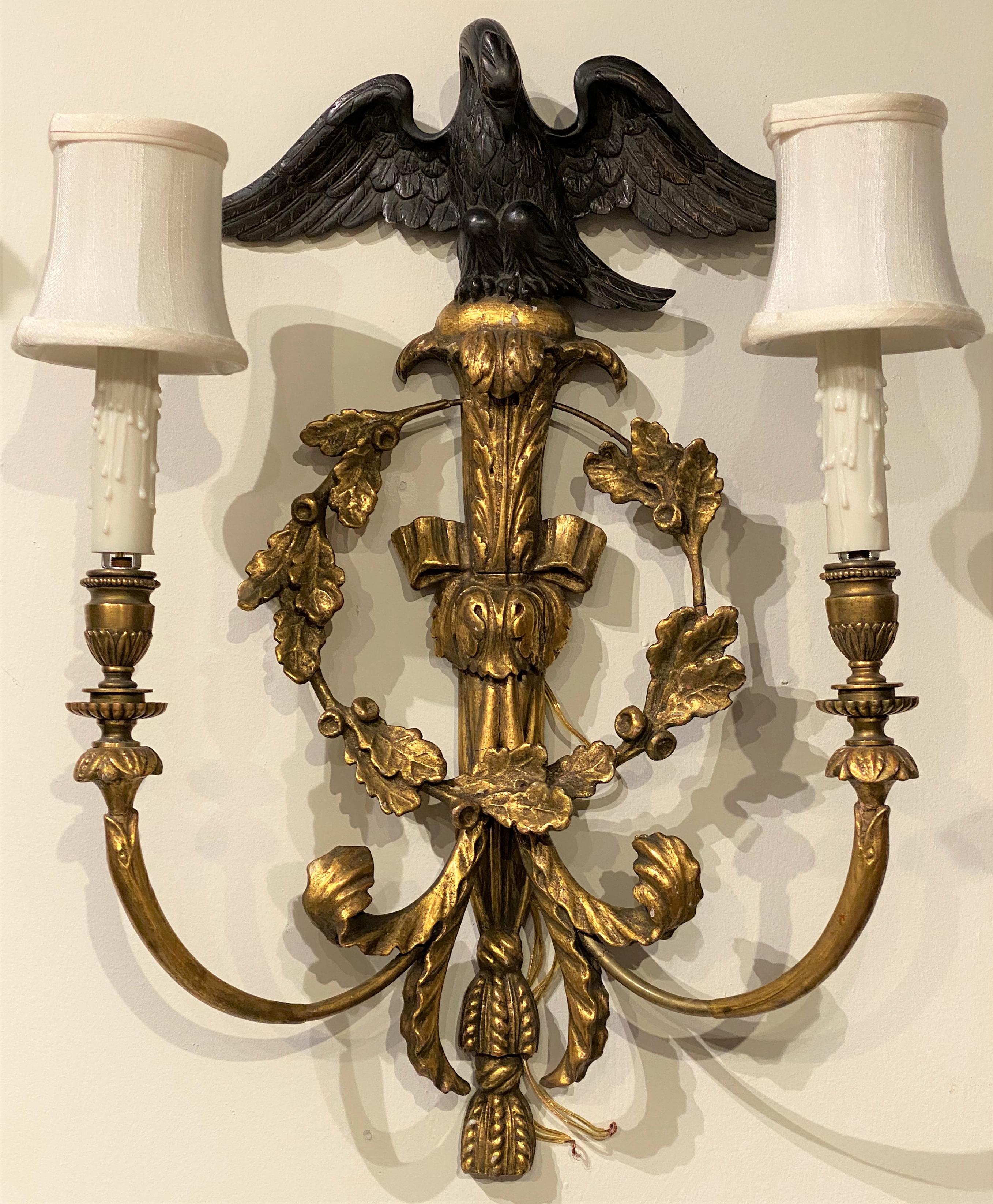 Pair of English Rococo Style Giltwood Two Light Sconces with Ebonized Eagle Tops In Good Condition For Sale In Milford, NH