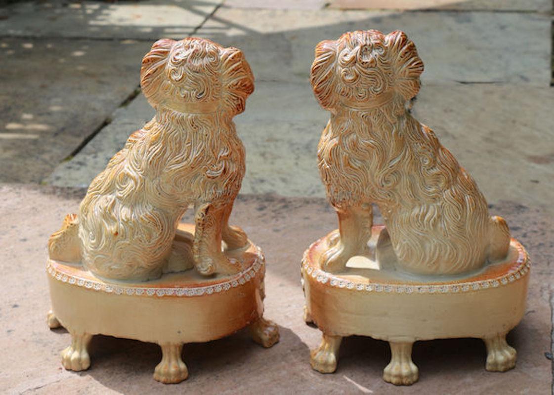 Mid-19th Century Pair of English Saltglaze Spaniels on Oval Bases, Briddon Pottery, 1830 For Sale