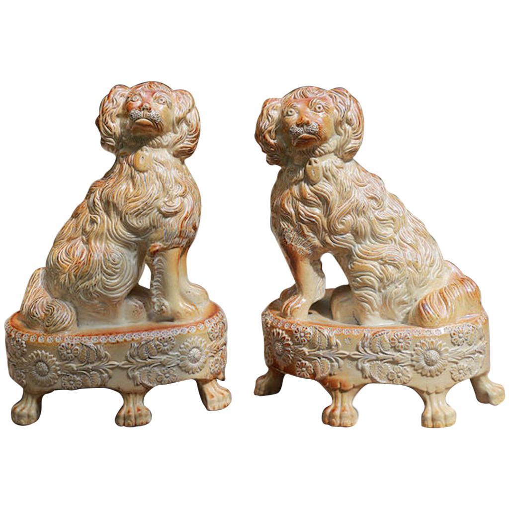 Pair of English Saltglaze Spaniels on Oval Bases, Briddon Pottery, 1830 For Sale