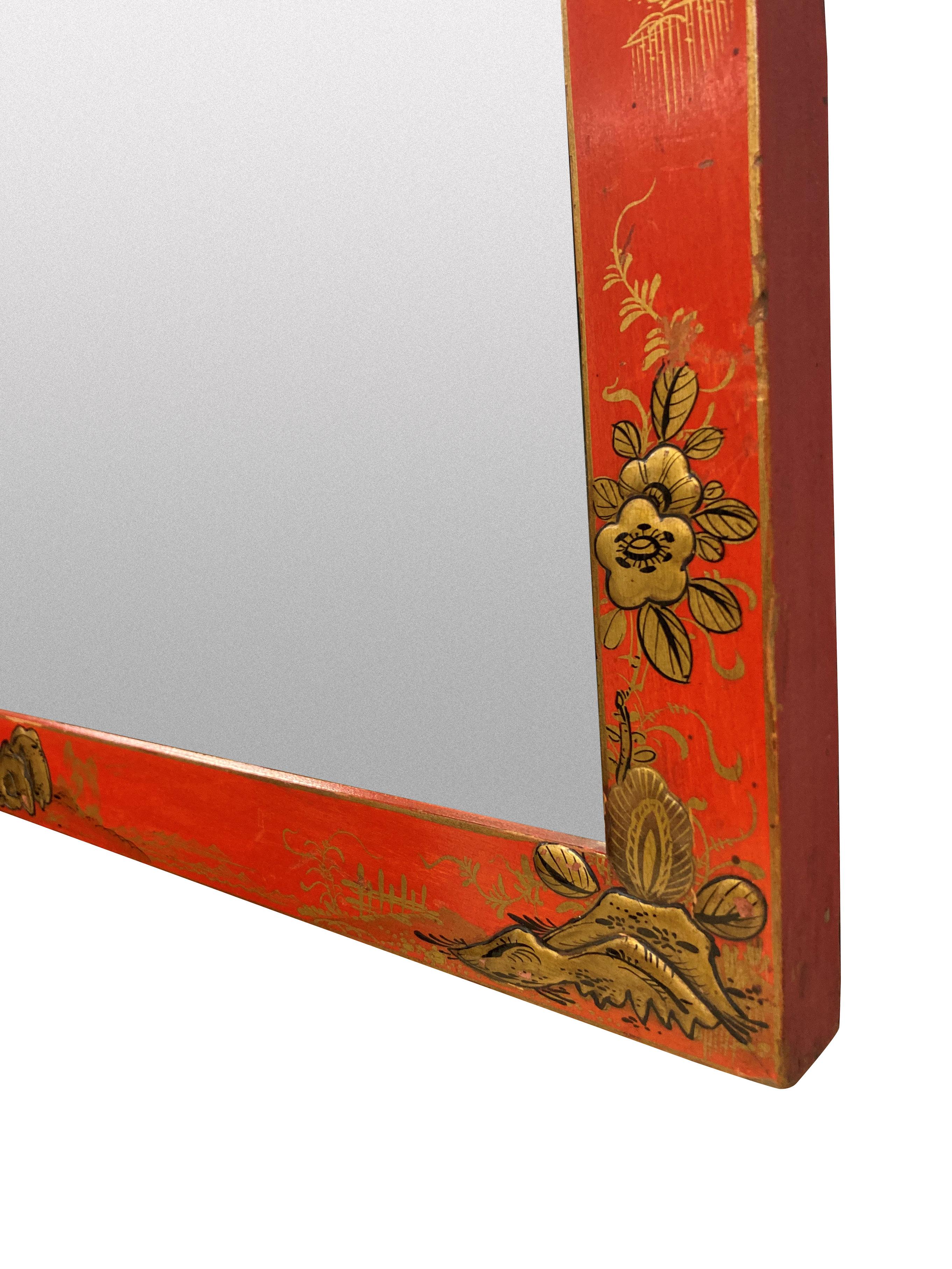 A pair of English Edwardian scarlet Japanned mirrors, each with different gold decoration. The plates are bevelled.