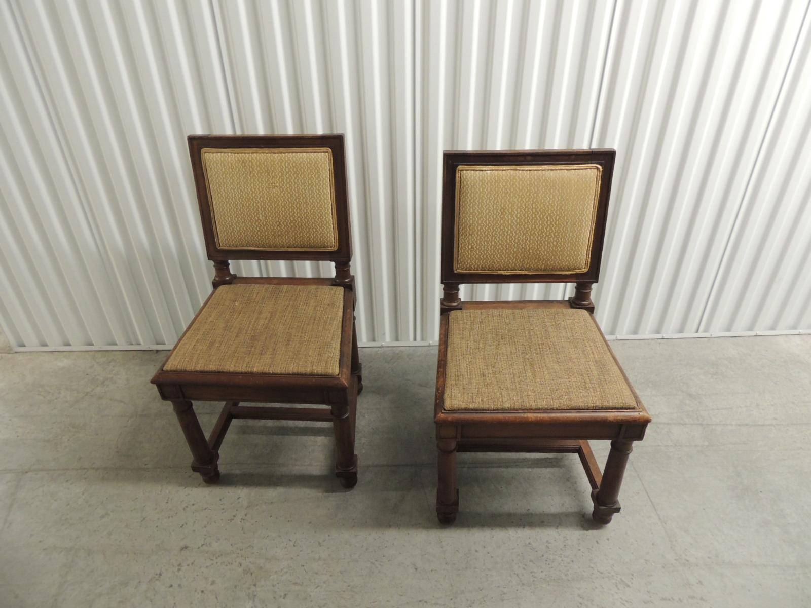 English wooden chairs upholstered in Fortuny Tapa fabric. The fabric is on back front of the chair and inset in the back, self welt.
Rounded wooden legs. The fabric color is yellow on maize. The seat is upholstered in chenille (needs new