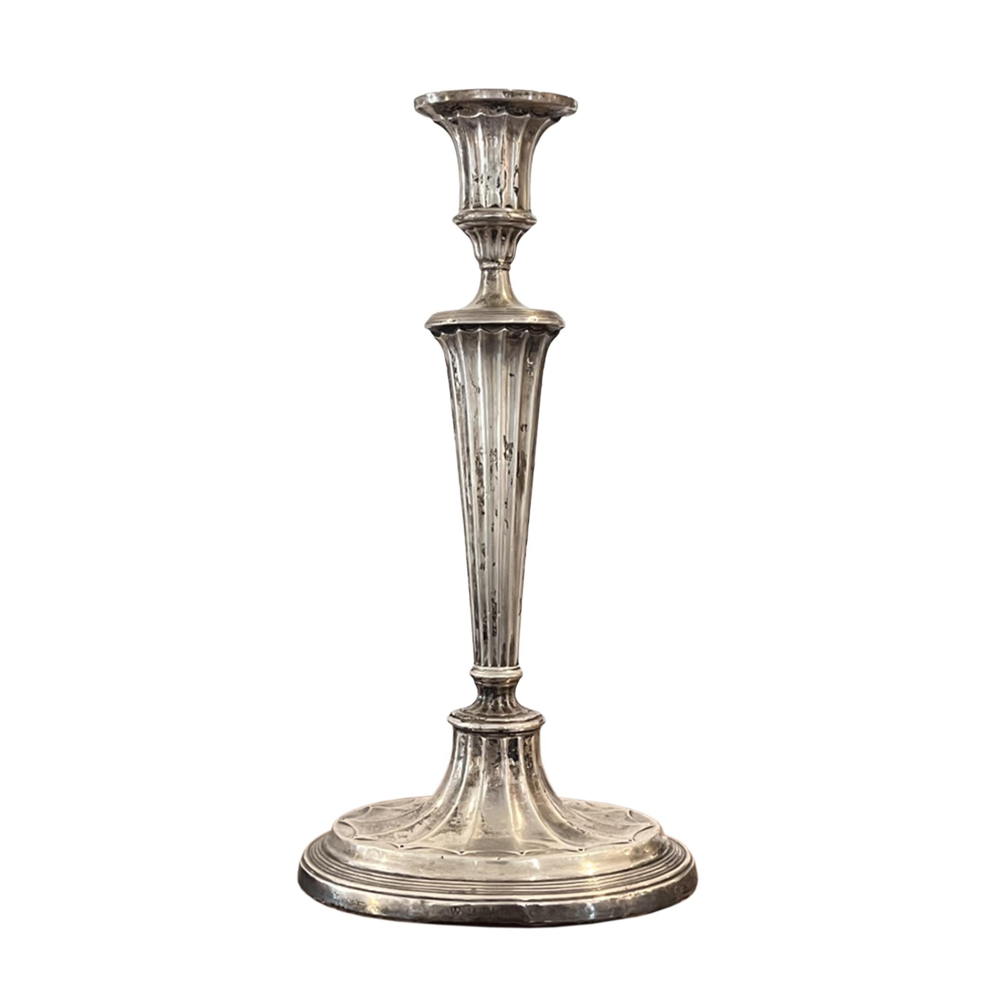 This elegant pair of silver candlesticks are hallmarked with the Birmingham, England assay mark for 1901.

Please take a look at all our pictures to see the graceful design of the sweeping bases. 

A great addition to a celebrational dining table