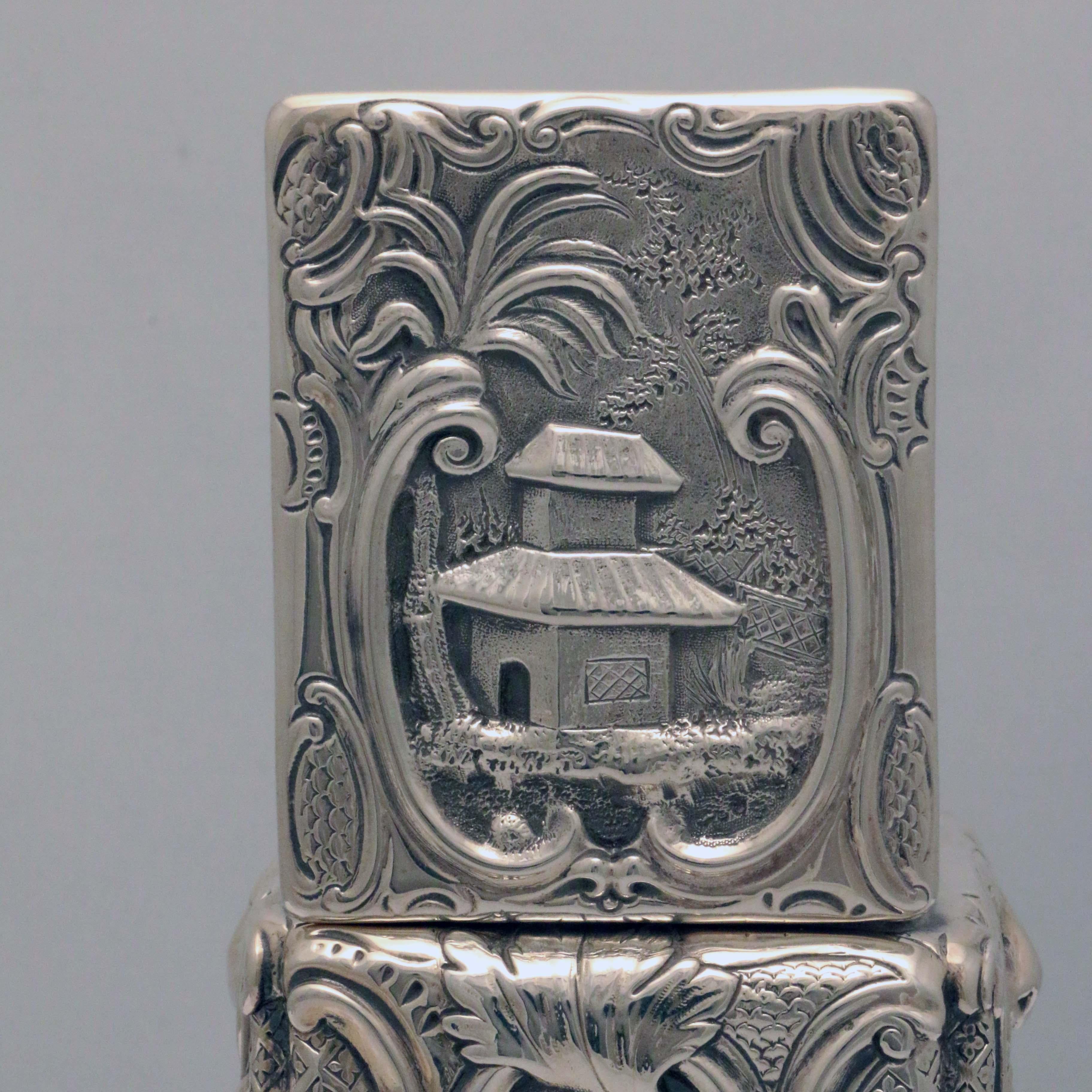 Metà XIX secolo Coppia di porta tè inglesi in argento a cineserie, metà del XIX secolo in stile rococò in vendita