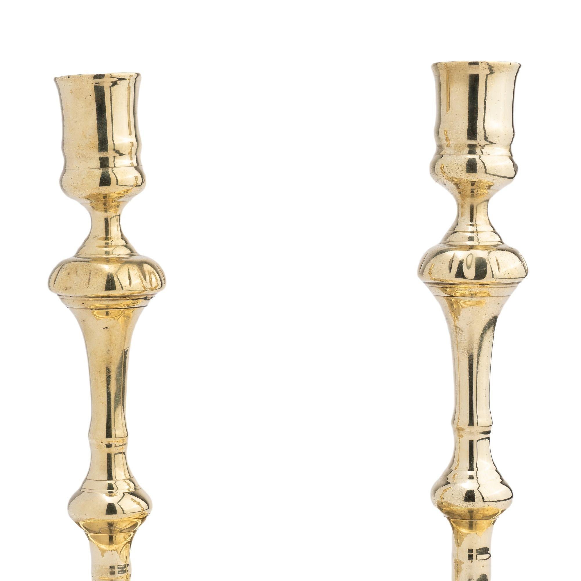 Brass Pair of English silver form cast brass candlesticks, 1680-1720 For Sale