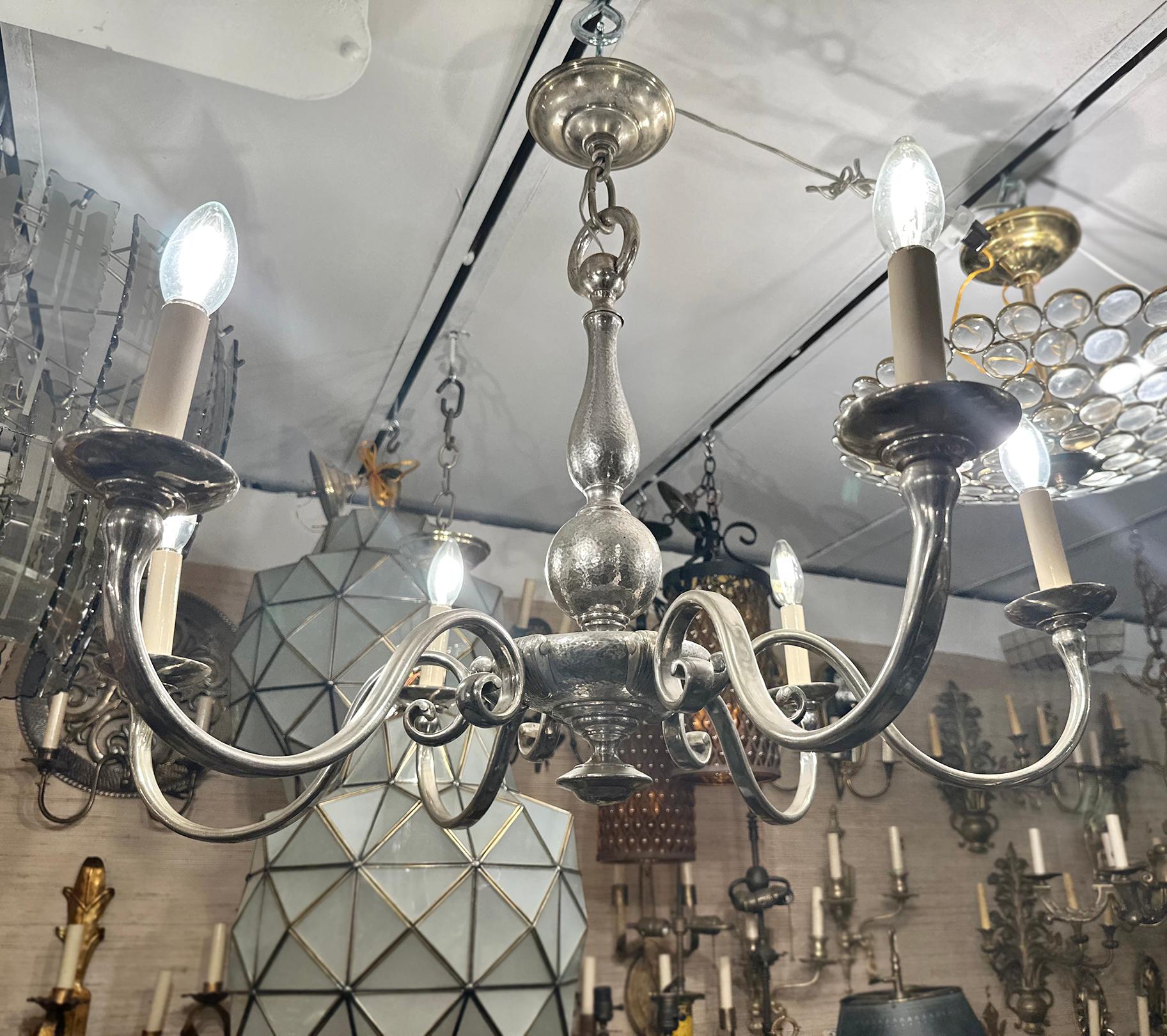 A pair of circa 1920's English silver plated chandelier. Sold individually.

Measurements:
Minimum drop: 24
