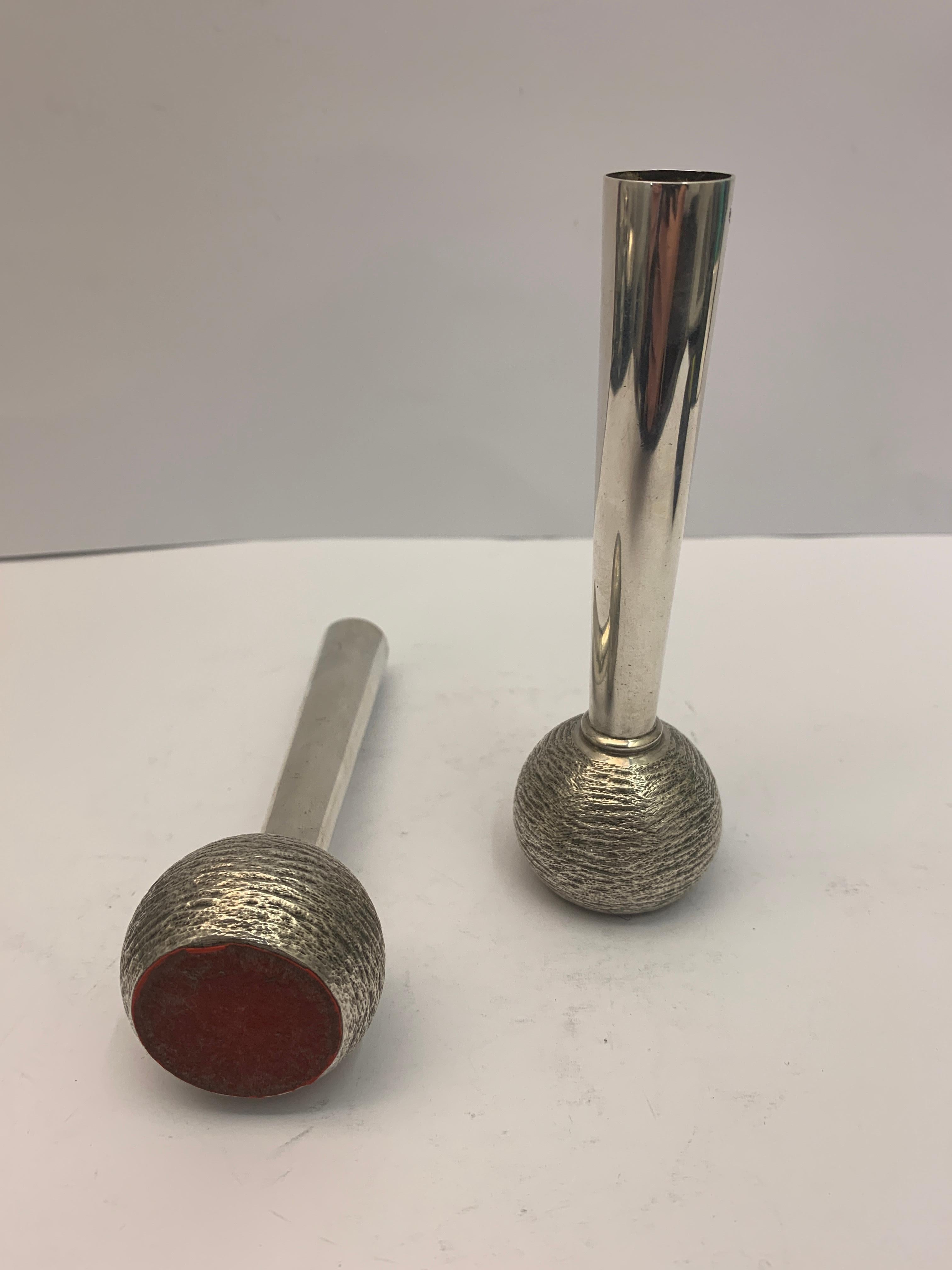 Pair of English silver slim vintage vases, made in Birmingham in 1973. 

Both of slim design with circular bases, both hallmarked.

 