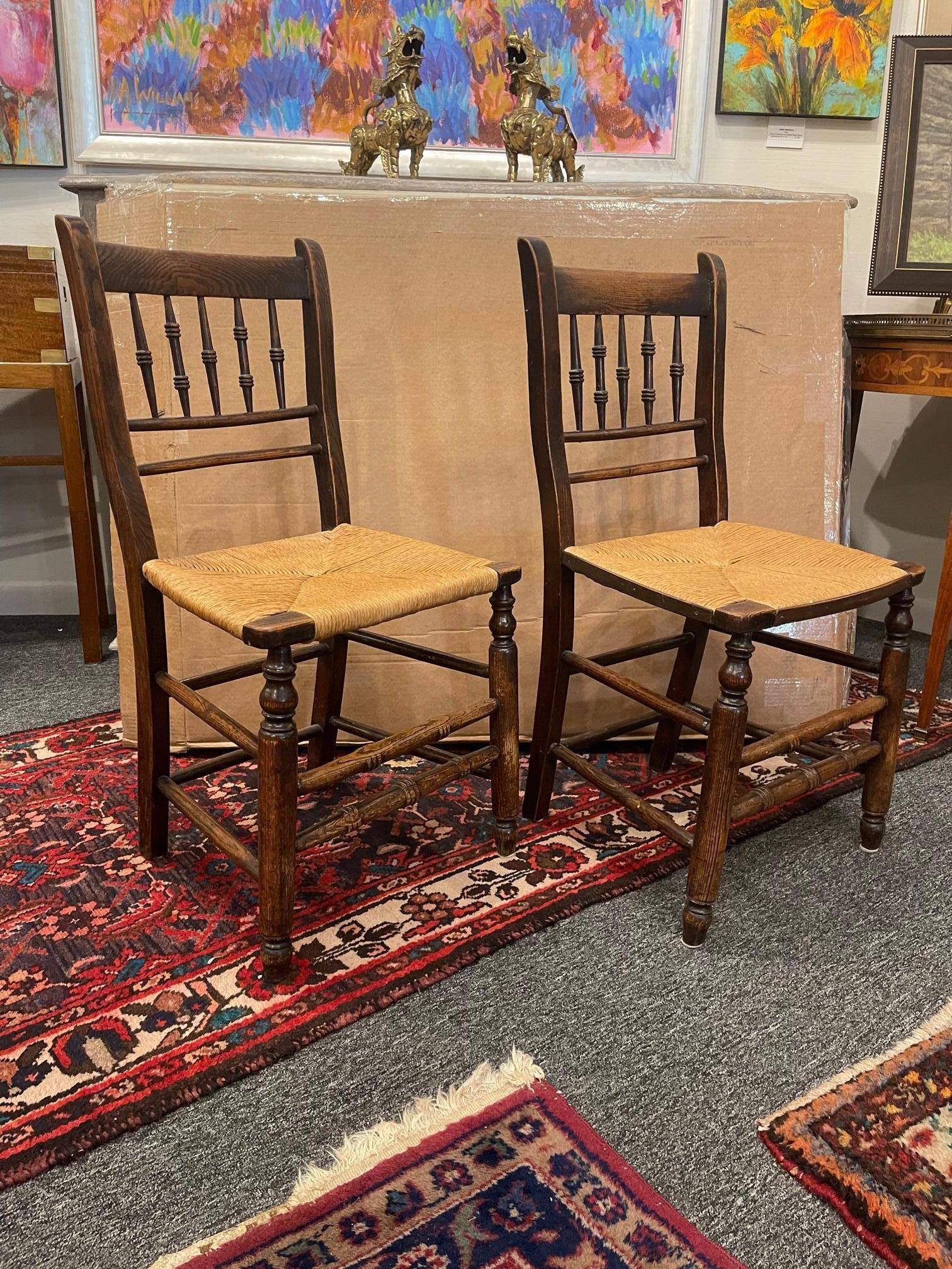 Pair of English spindleback side chairs with rush seats, early 19th century. 32.75