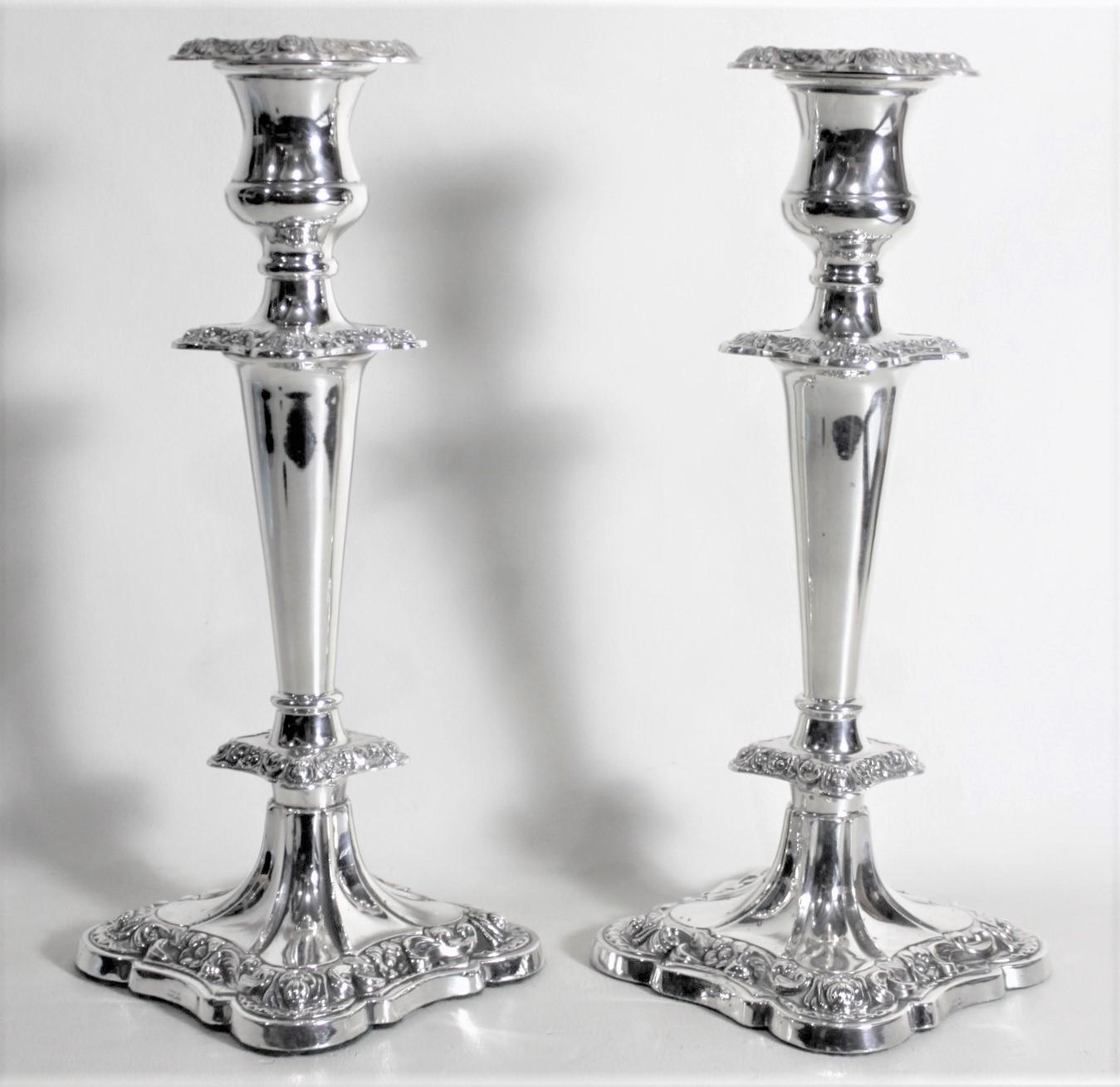 Edwardian Pair of English Sterling Silver Candlesticks with Chased Floral Decoration